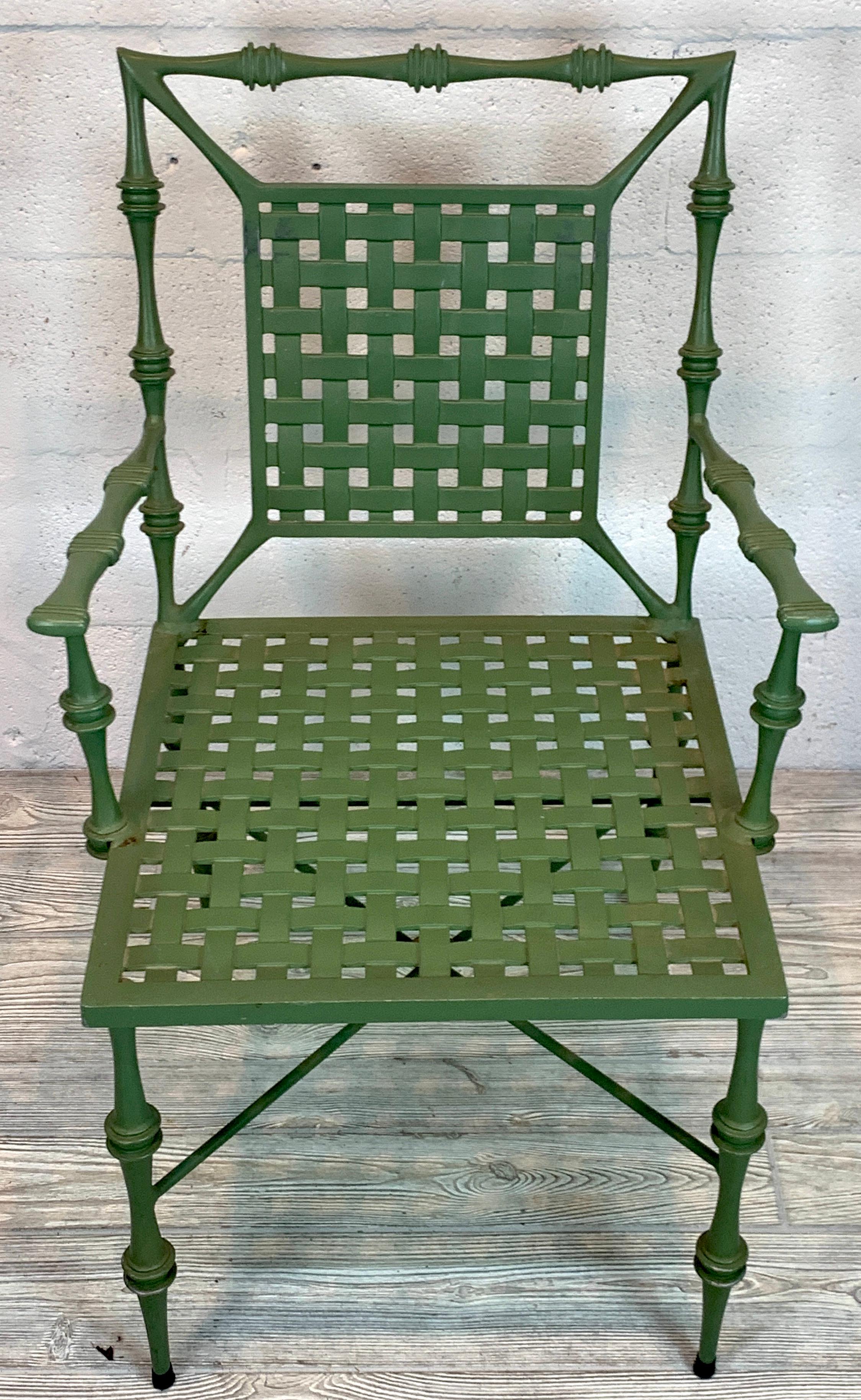 A Faux Bamboo Arm Chair by Phyllis Morris, Sold Individually, Four Armchairs Available 
Each chair a well proportioned model with elongated faux bamboo frame with woven back rest and seat. In the original factory green finish, ready to use as it is,