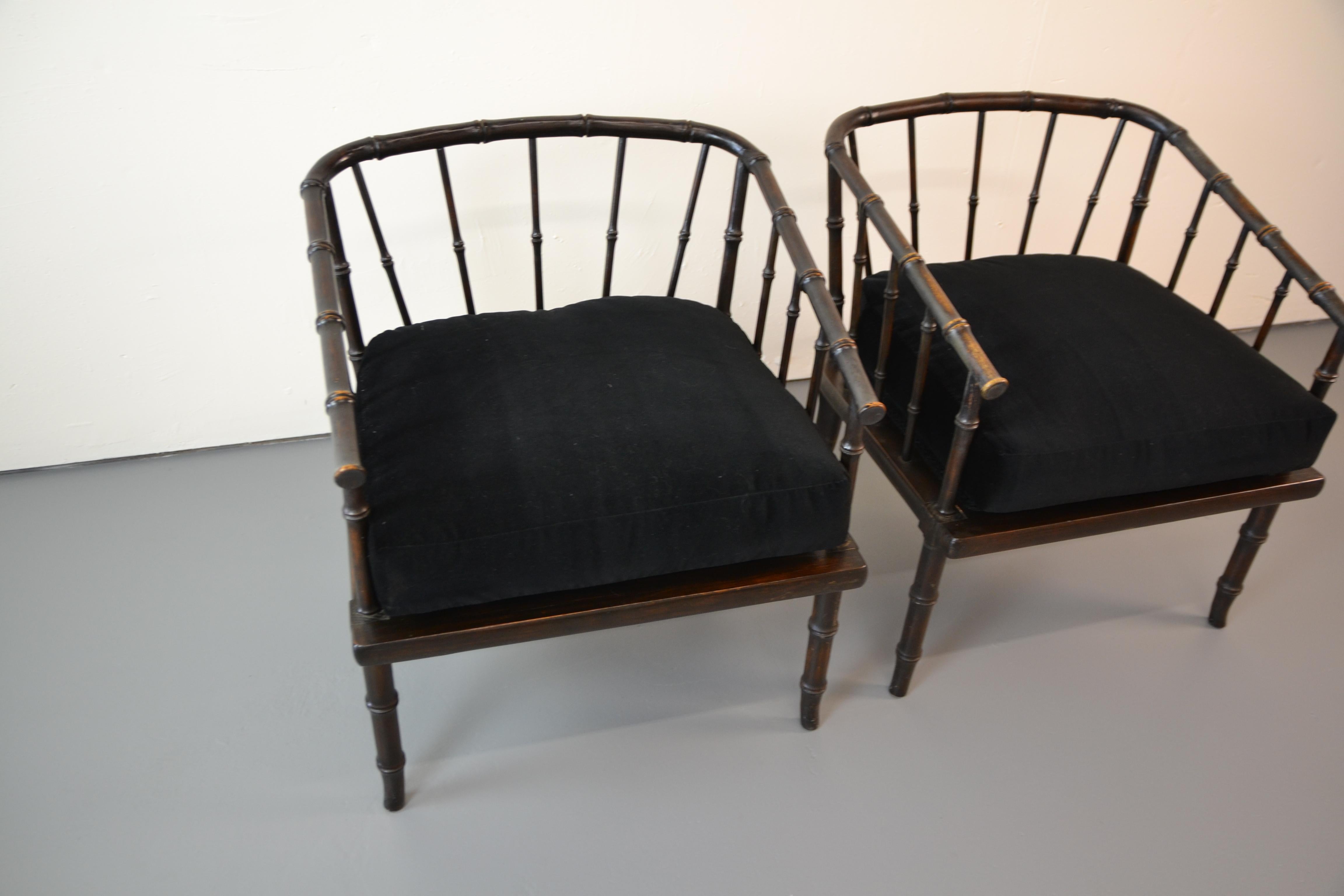 Pair of faux bamboo armchairs. Upholstered in black velvet.
