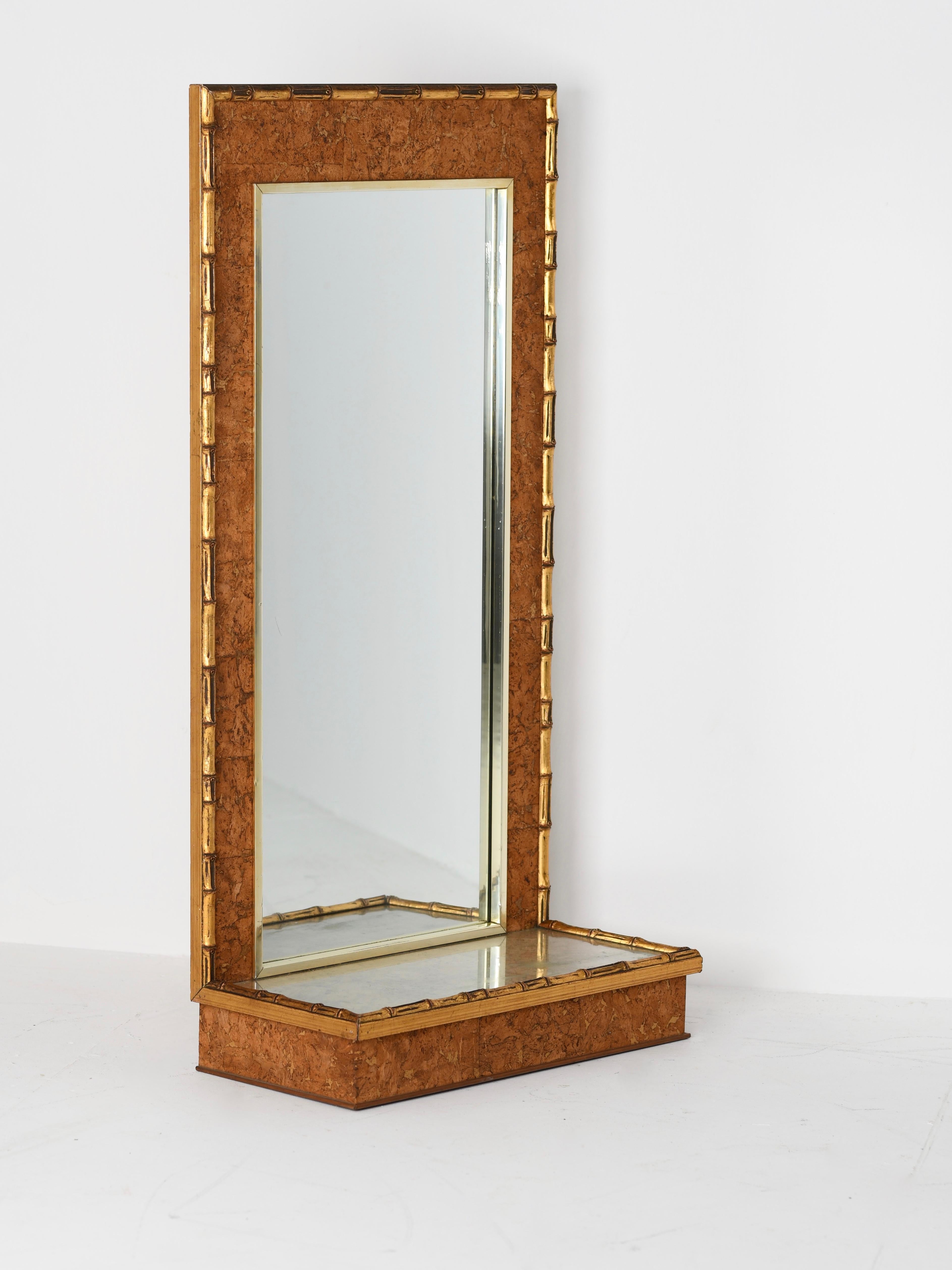 1970s Italian faux gilt bamboo console or bedroom mirror with cork inserts in the Gabriella Crespi style.