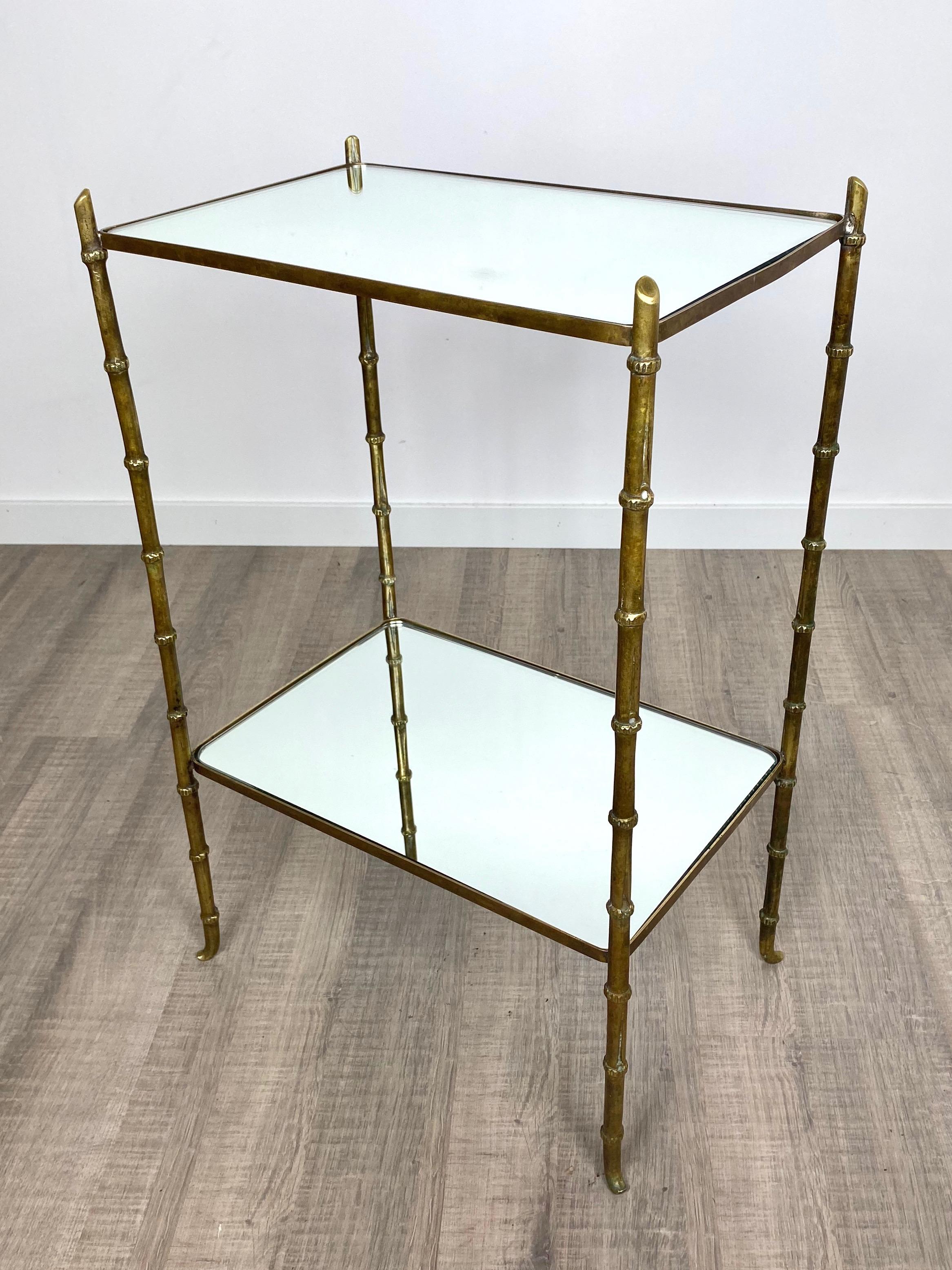 Side table in faux bamboo brass solid structure and two mirror shelves by Maison Bagues. France, 1950s.