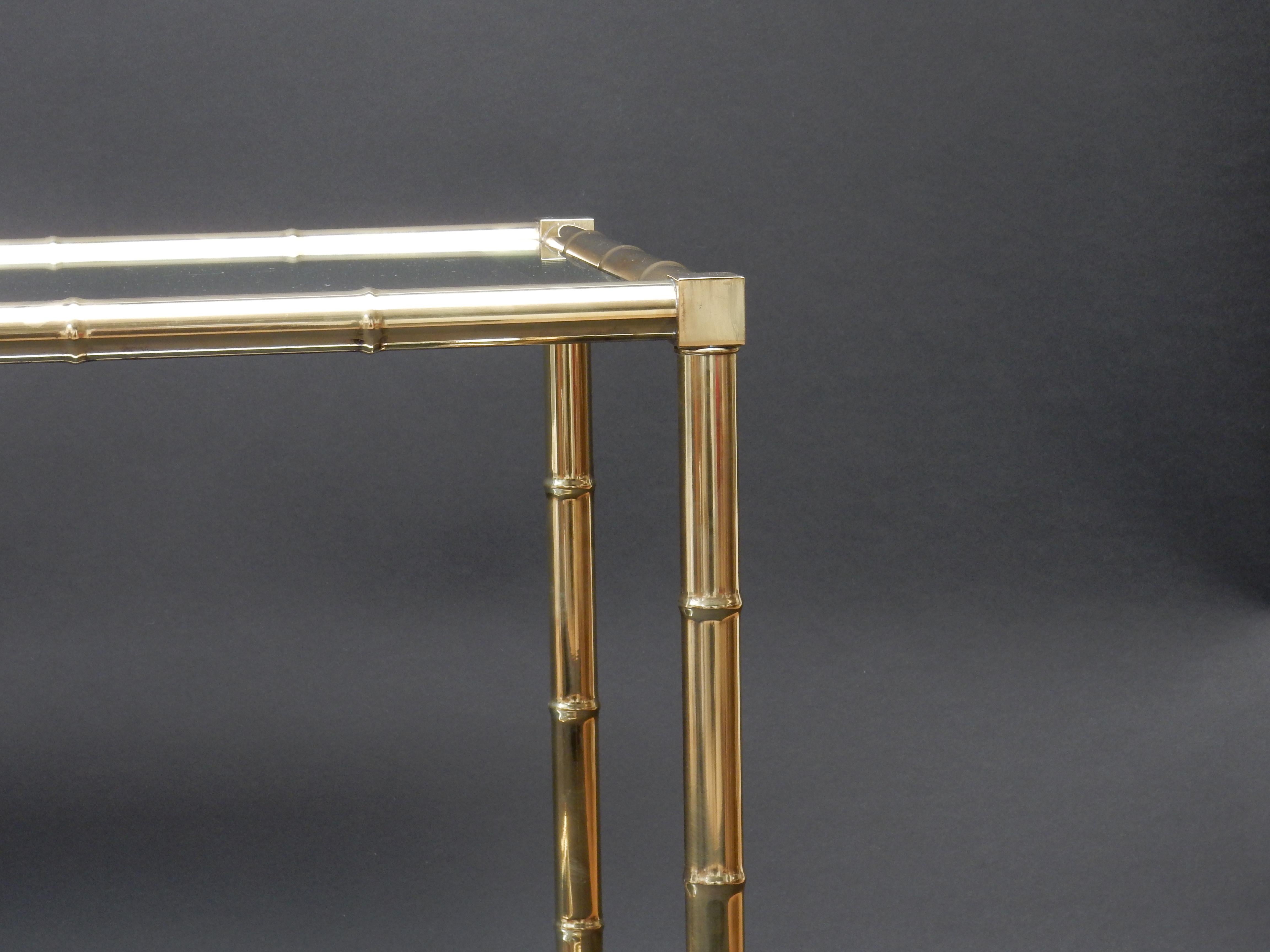 French 1970s faux bamboo brass bar cart with its original glass.