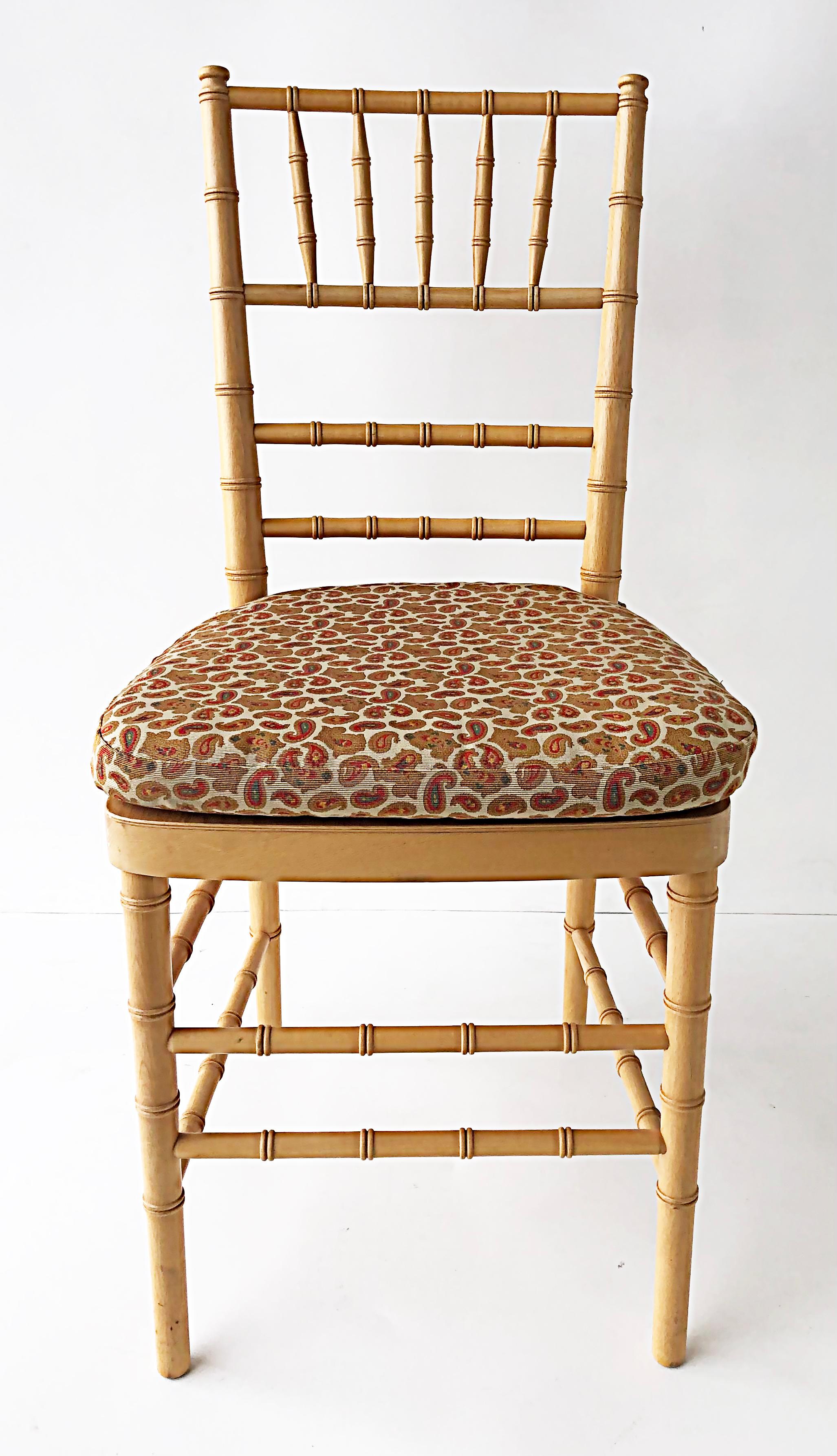 Faux bamboo chair with loose Paisley seat cushion

Offered for sale is a faux-bamboo carved wood chair that has a loose upholstered cushion in a mini paisley pattern. This chair is reminiscent of Victorian ballroom chairs. The chair has a delicate