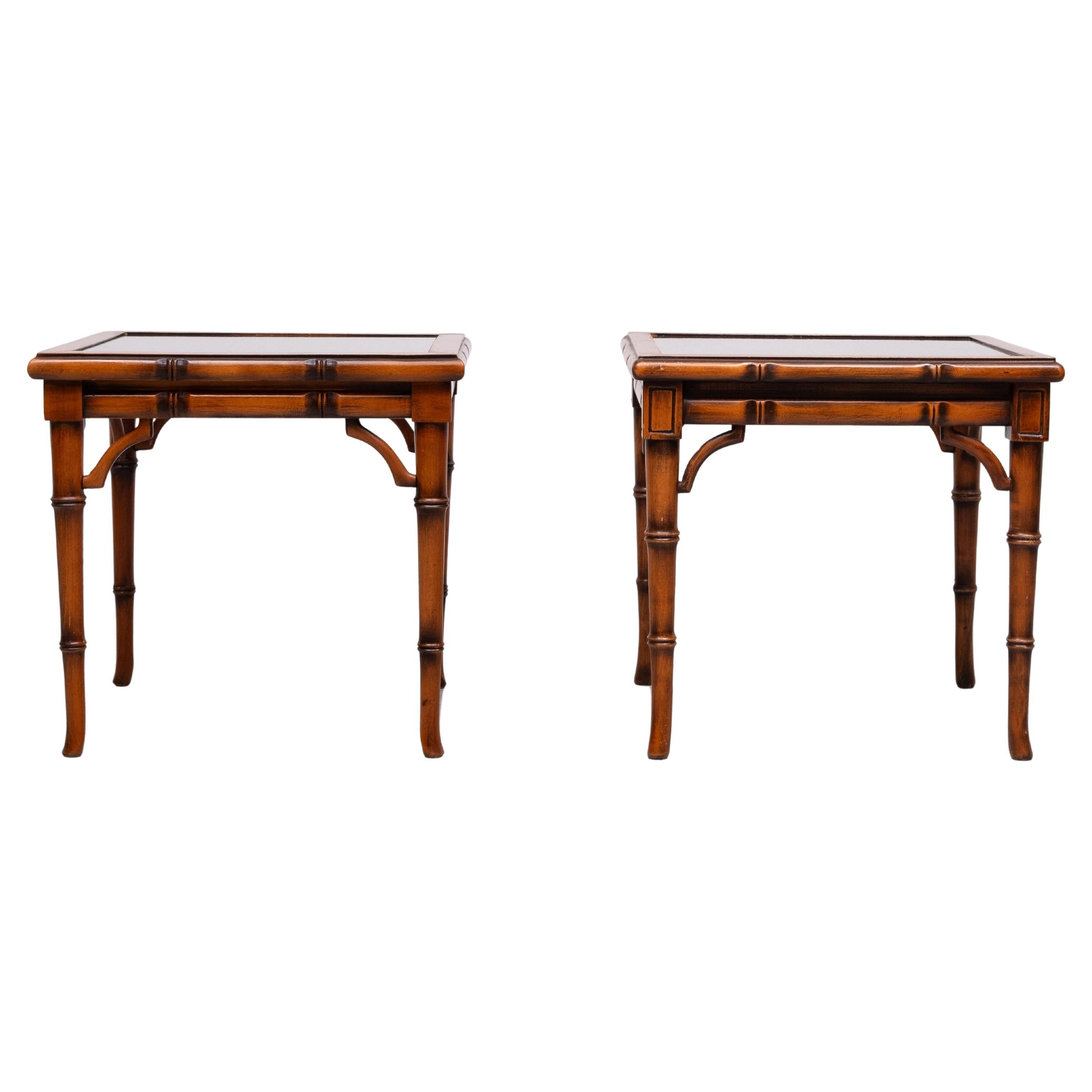 Very nice set of side tables ,Faux Bamboo Cherry wood ,comes with a Wicker top .protected by a Glass plate . 
 

