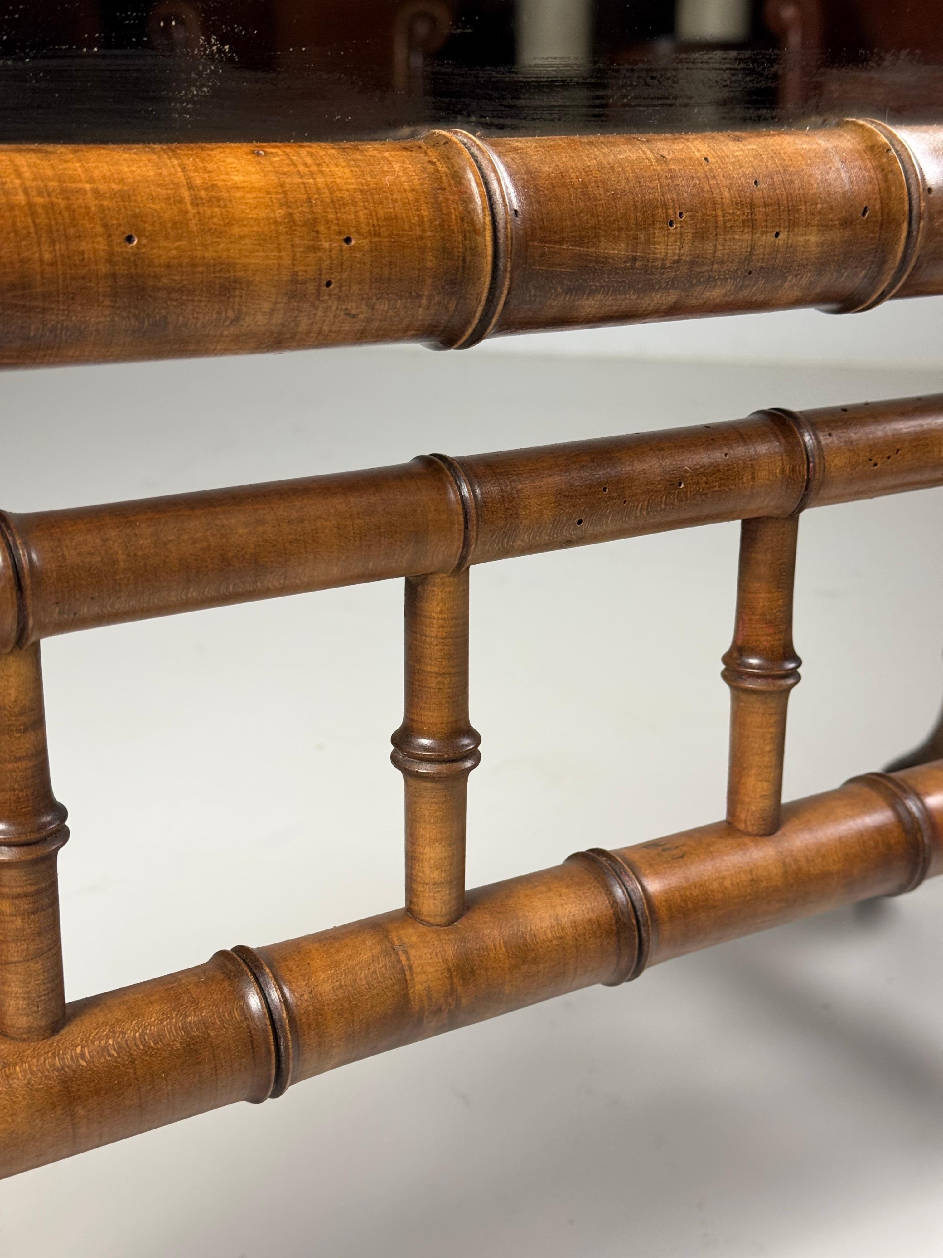 Faux Bamboo Cheval Mirror

Very large full-length mirror in faux bamboo motif.
From France, circa 1900.

In very good condition! Beautiful colour.
Stands on brass wheels.

Dimensions: 167H x 89W x 57D