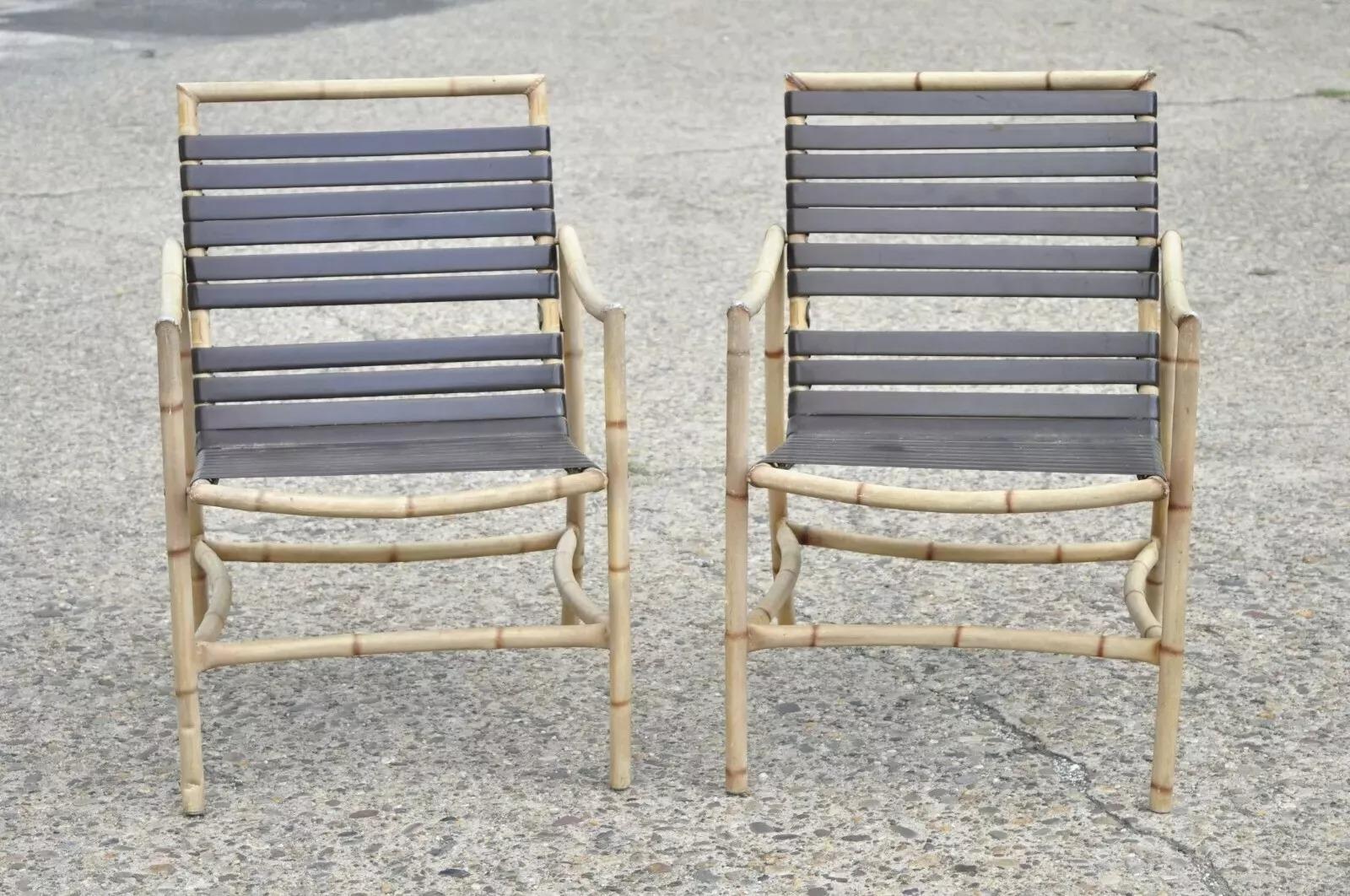Vintage Faux Bamboo Chinese Chippendale Aluminum Vinyl Strap Pool Patio Arm Chairs - a Pair. Item features rubberized vinyl straps, faux bamboo design, cast aluminum construction, great style and form. Circa Late 20th Century. Measurements: 33