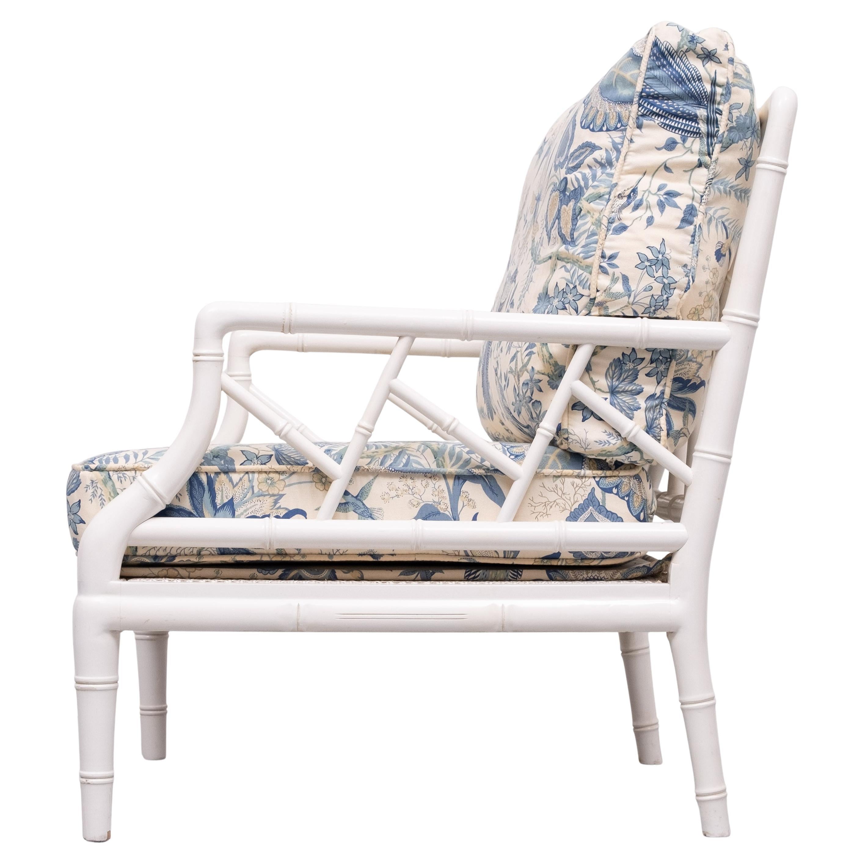 Beautiful low armchair .Faux Bamboo wooden frame ,comes with a 
Wicker seat .protected by a special cover ,custom made  for this chair .
Top quality upholstery .Blue with Birds and Flowers. flit with feathers cushions 
Very good quality . High gloss