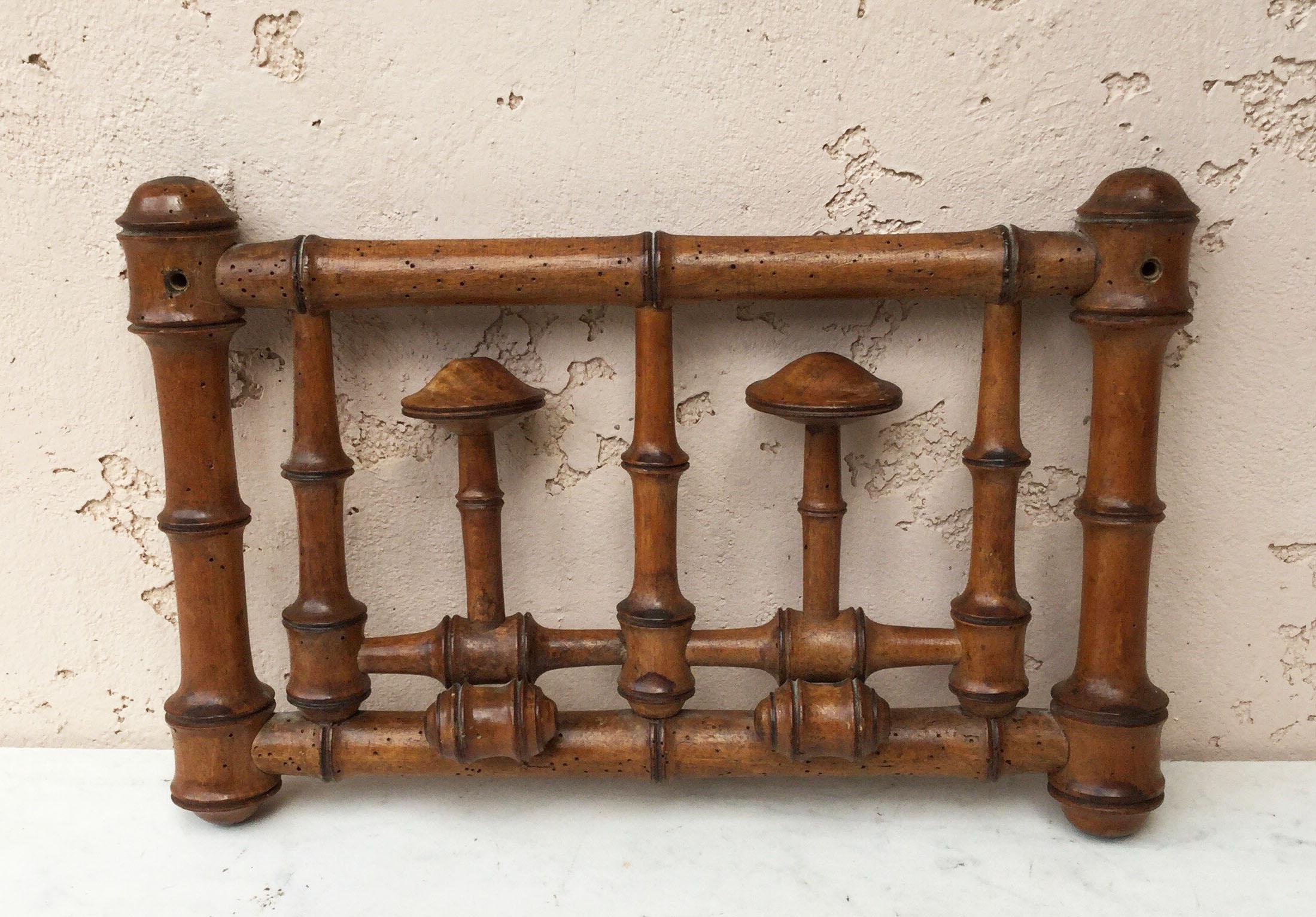 Faux bamboo coat rack circa 1900 with 2 hooks.