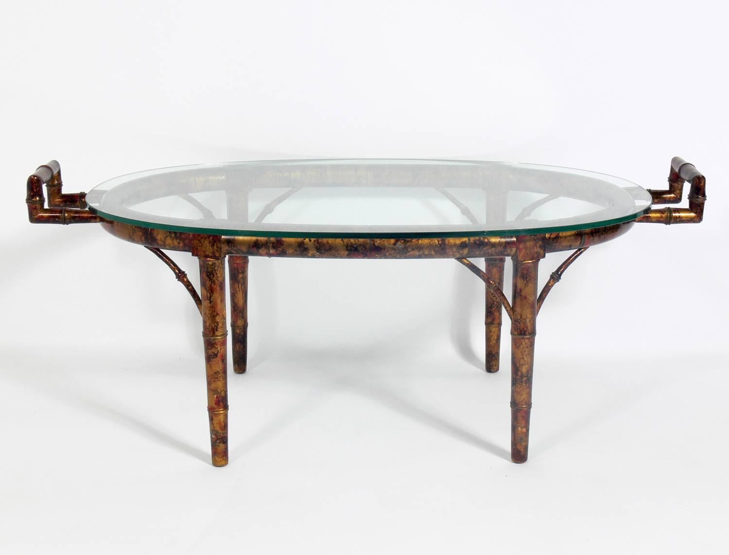 Faux bamboo coffee table in the manner of James Mont, American, circa 1950s.