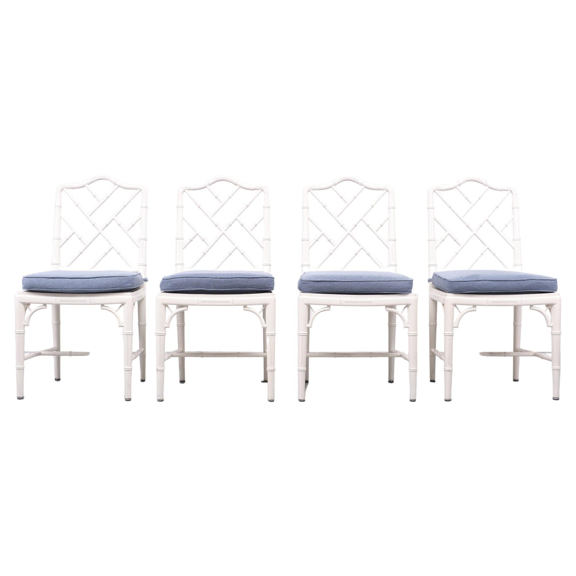 Very nice set of 4 Chinese Chippendale dining chairs. Bright White color. Rattan seating 
comes with baby Blue cushions. Nice and freshly wash. Very good condition.
good quality chairs.