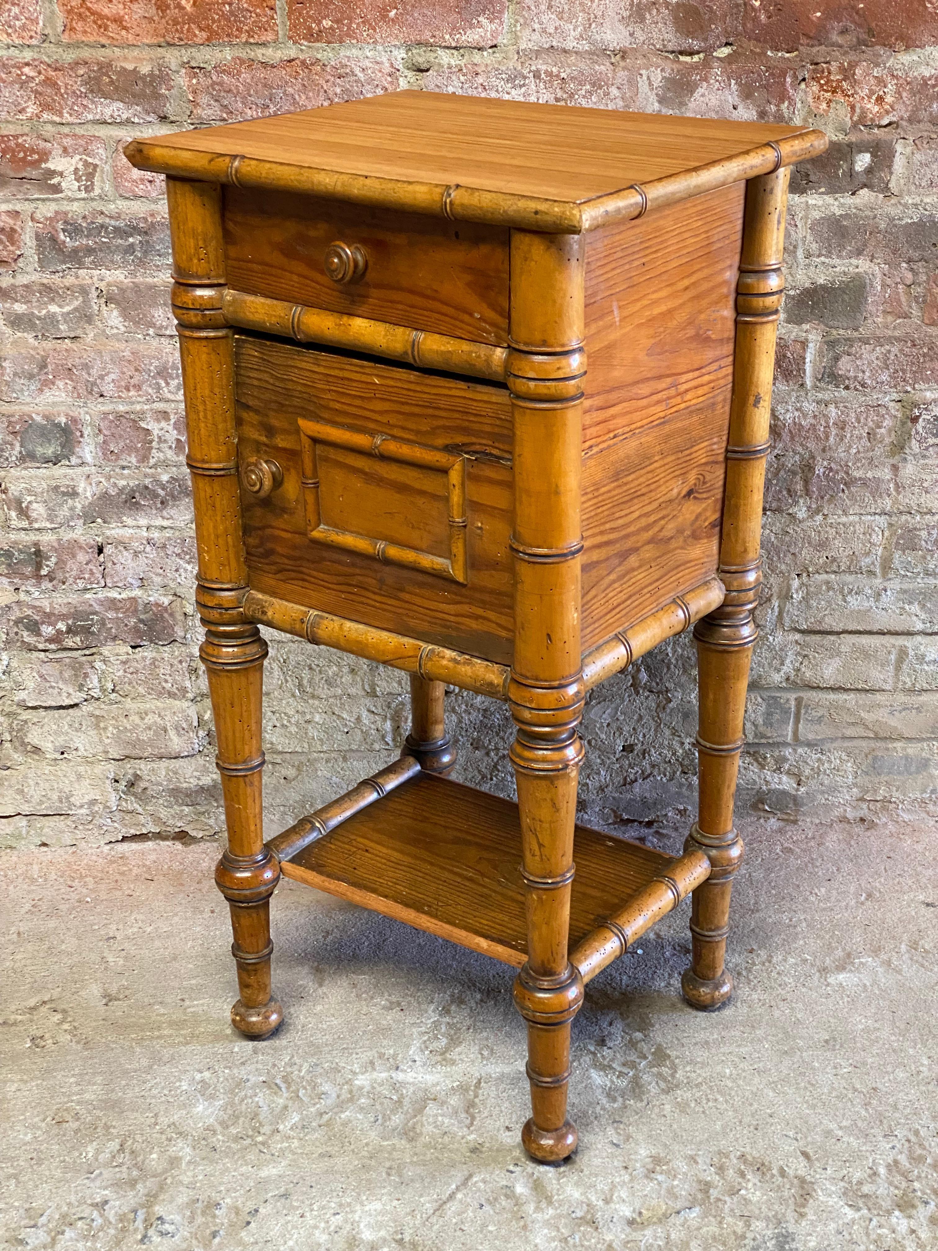 Faux bamboo end table or side table most likely European in origin (Northern Italy or Austria). Circa 1890-1910. Made of solid pine construction with a bamboo top. The interior is galvanized metal lined. Nicely turned legs that support a single