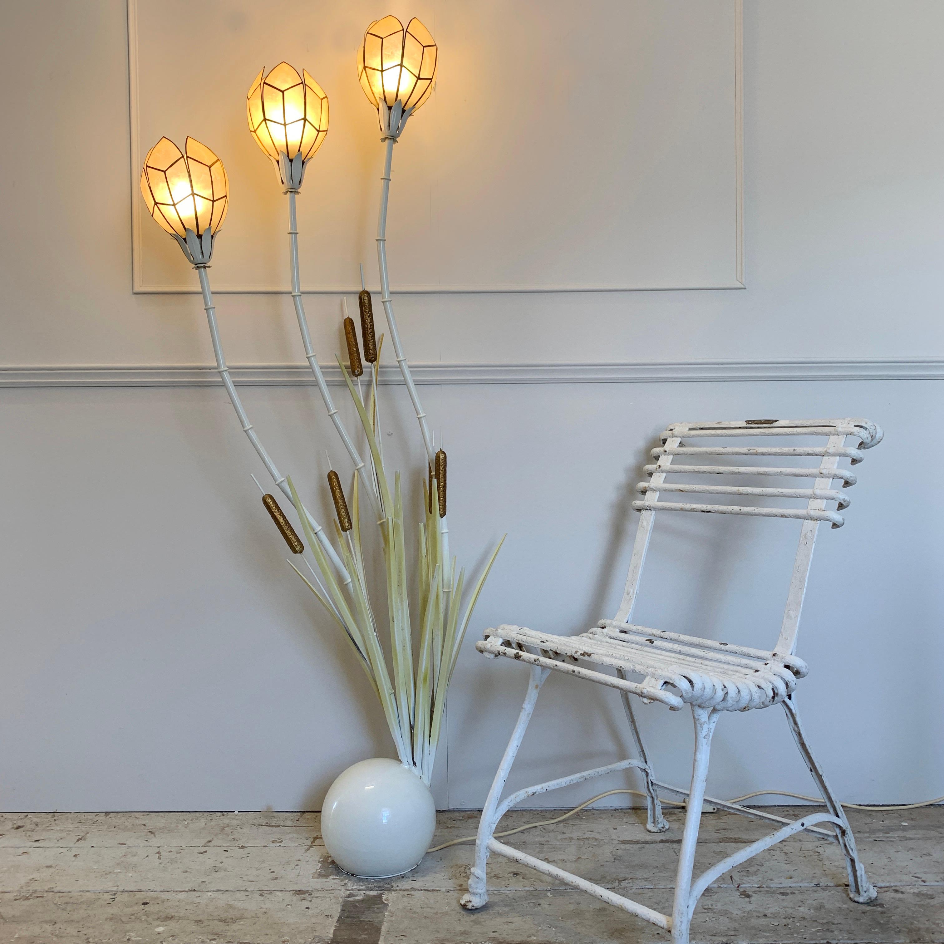 1980s faux bamboo and bulrush floor lamp with shell shades
An elegant large floor lamp depicting bamboo stems with bulrushes and leaves
The 3 bamboo stems have handcrafted metal and shell inlay shades, they give a beautiful soft glow
There is a