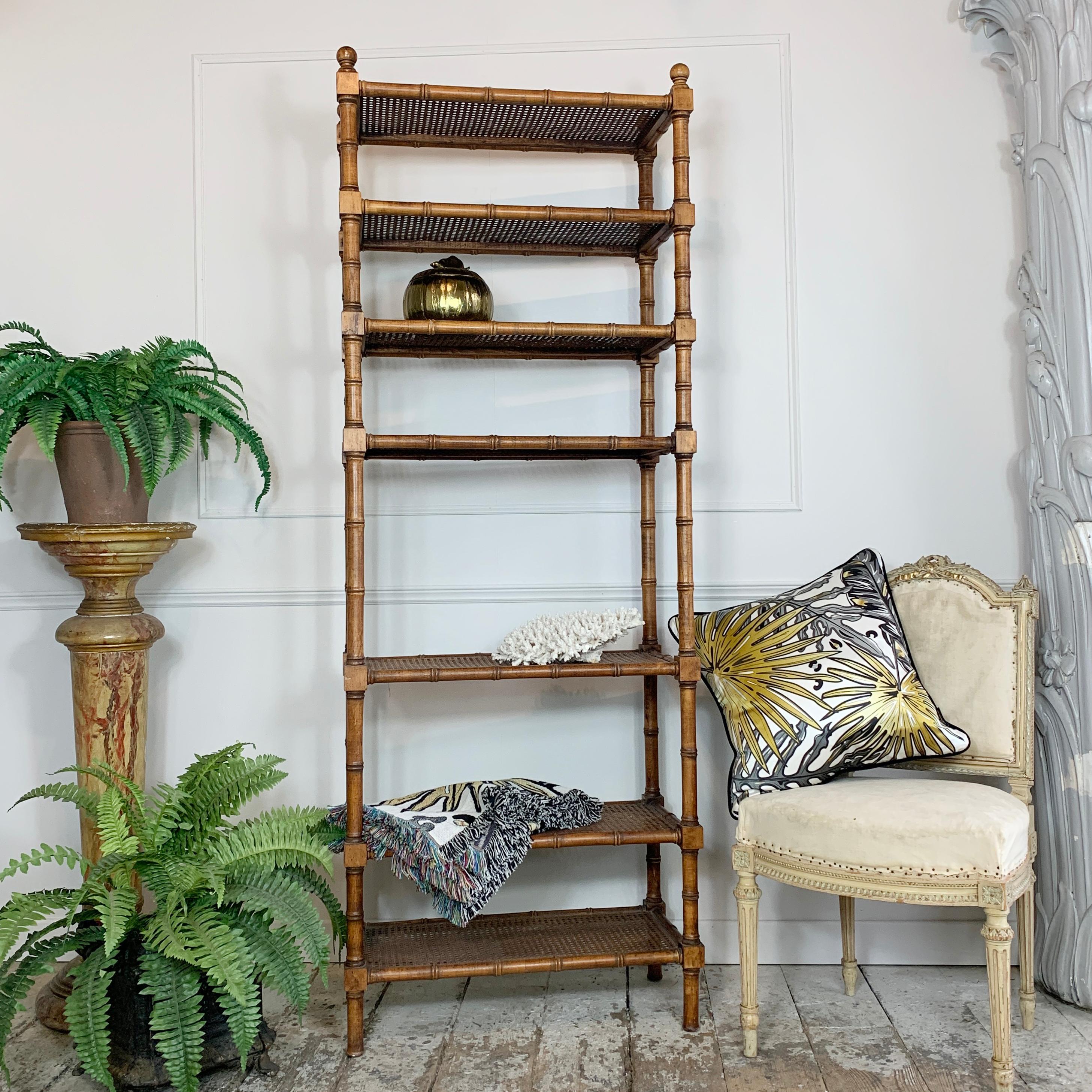 Wonderful French Faux Bamboo Etagere, the frame is pine, all shelving is canework. Dating to circa 1925-1940, this tall elegant etagere is of impeccable quality, has 7 shelves, all the canework is in very good order as you can see from the