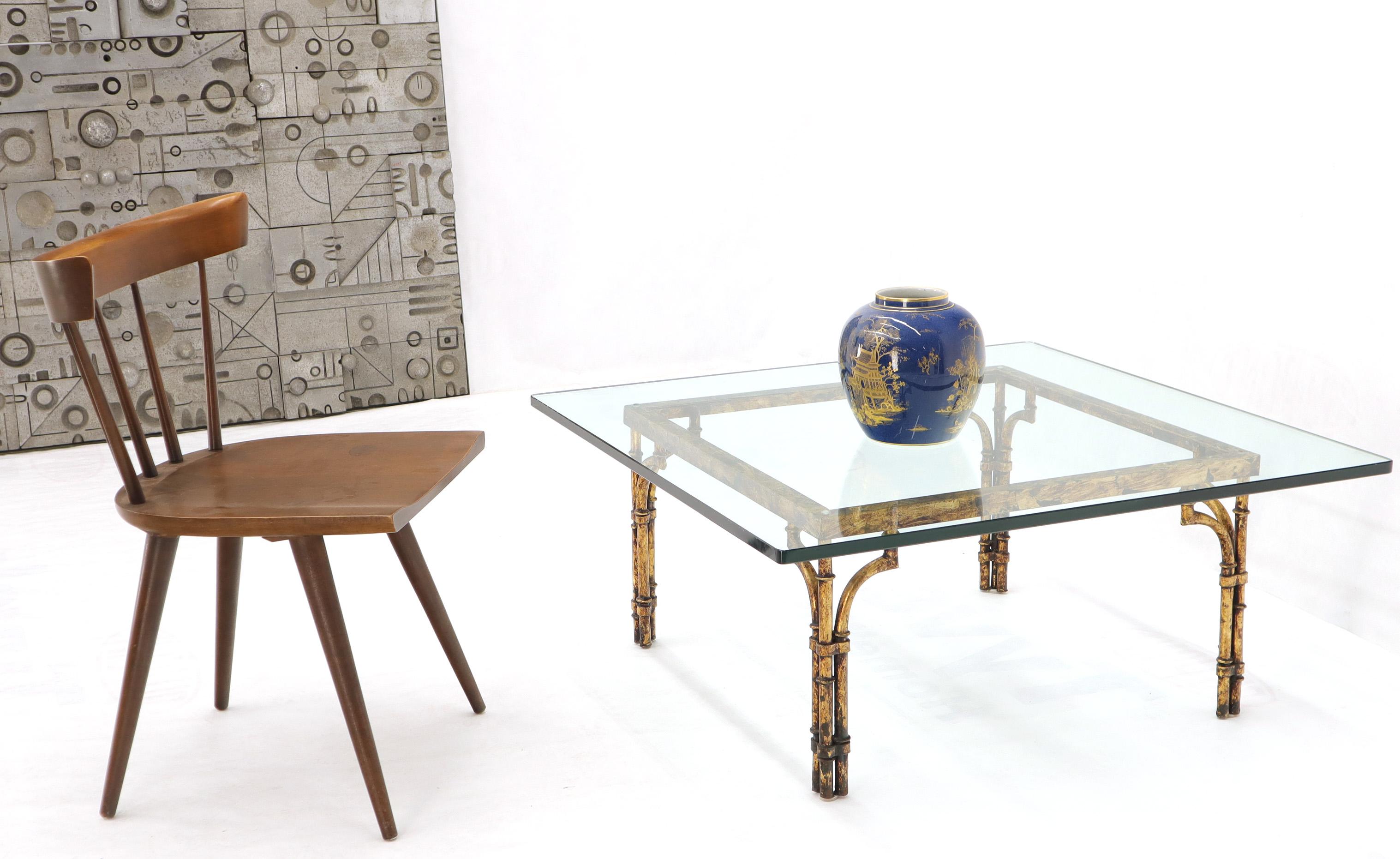 Mid-Century Modern square glass coffee table on faux bamboo gold gilt base.
