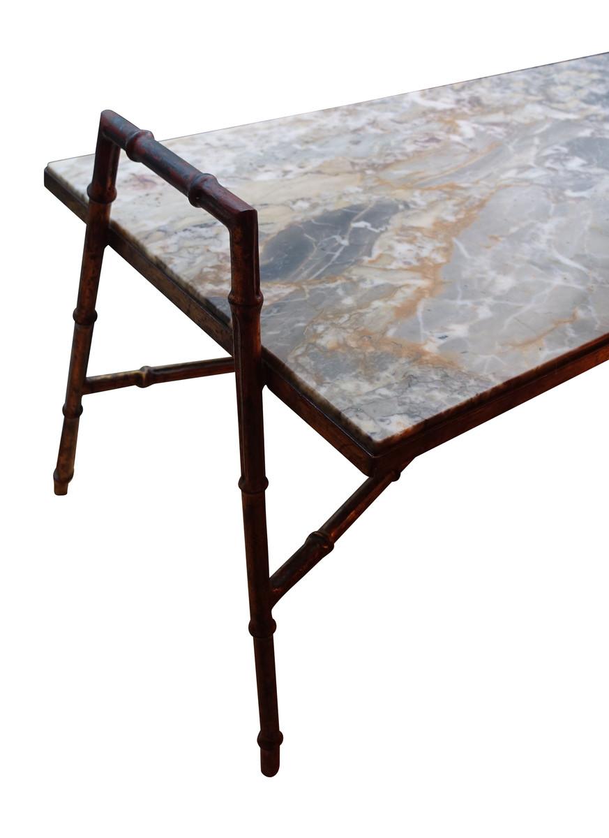 Midcentury French faux bamboo iron framed coffee table with marble top
Beautiful natural weathered redish patina on iron frame.