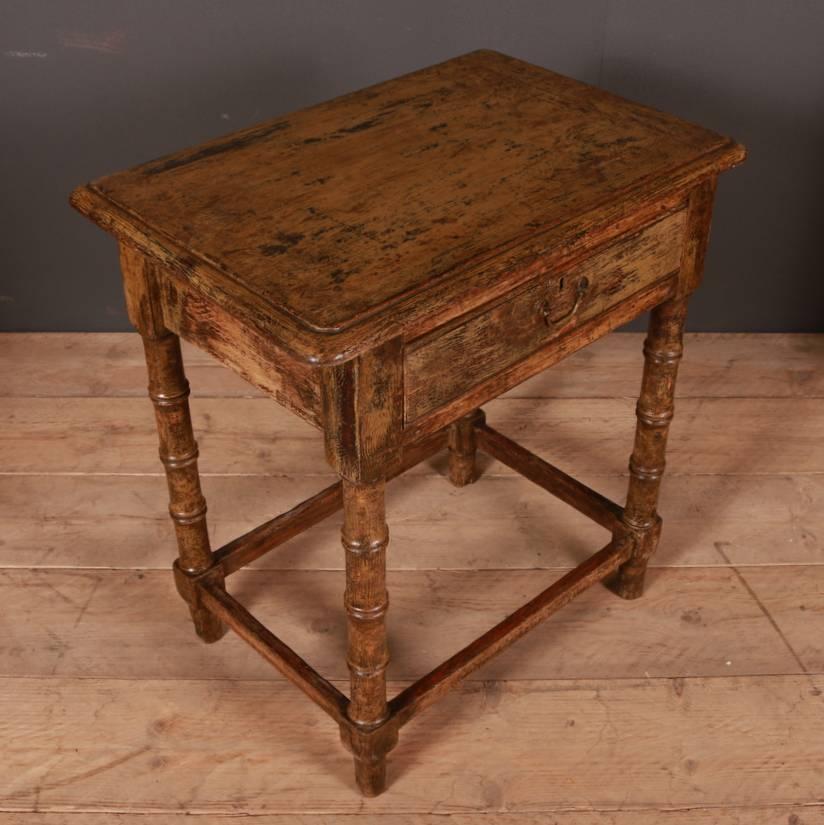 Small early 19th Century Faux bamboo lamp table with original finish, 1820.

Dimensions
27.5 inches (70 cms) wide
18.5 inches (47 cms) deep
29.5 inches (75 cms) high.

       