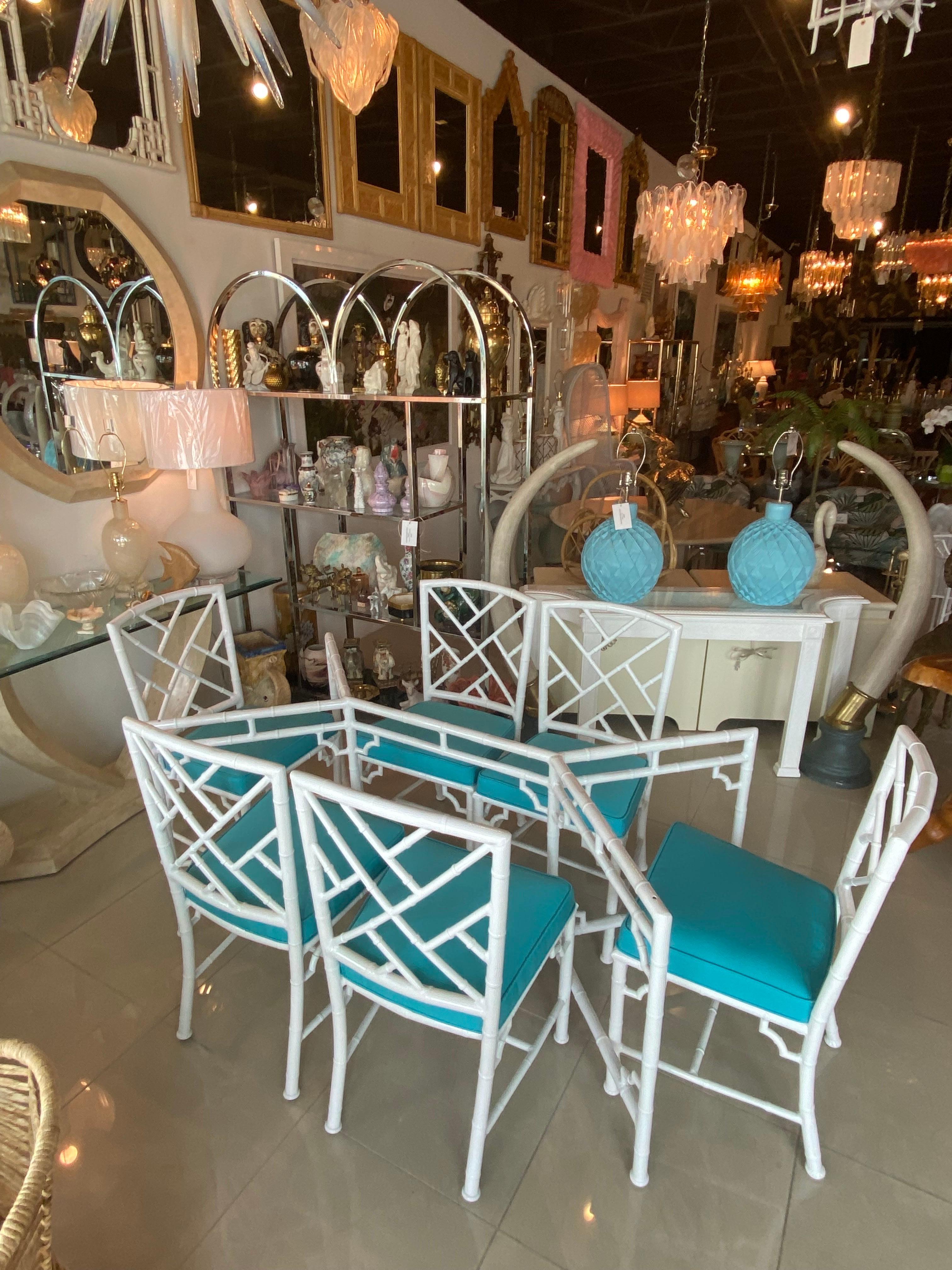 Lovely vintage faux bamboo metal patio set, 7 pieces. Set includes dining table & 6 dining chairs. Glass top not included. This set has been completely restored to perfection. The set has been professionally powder-coated in a lovely white. All the