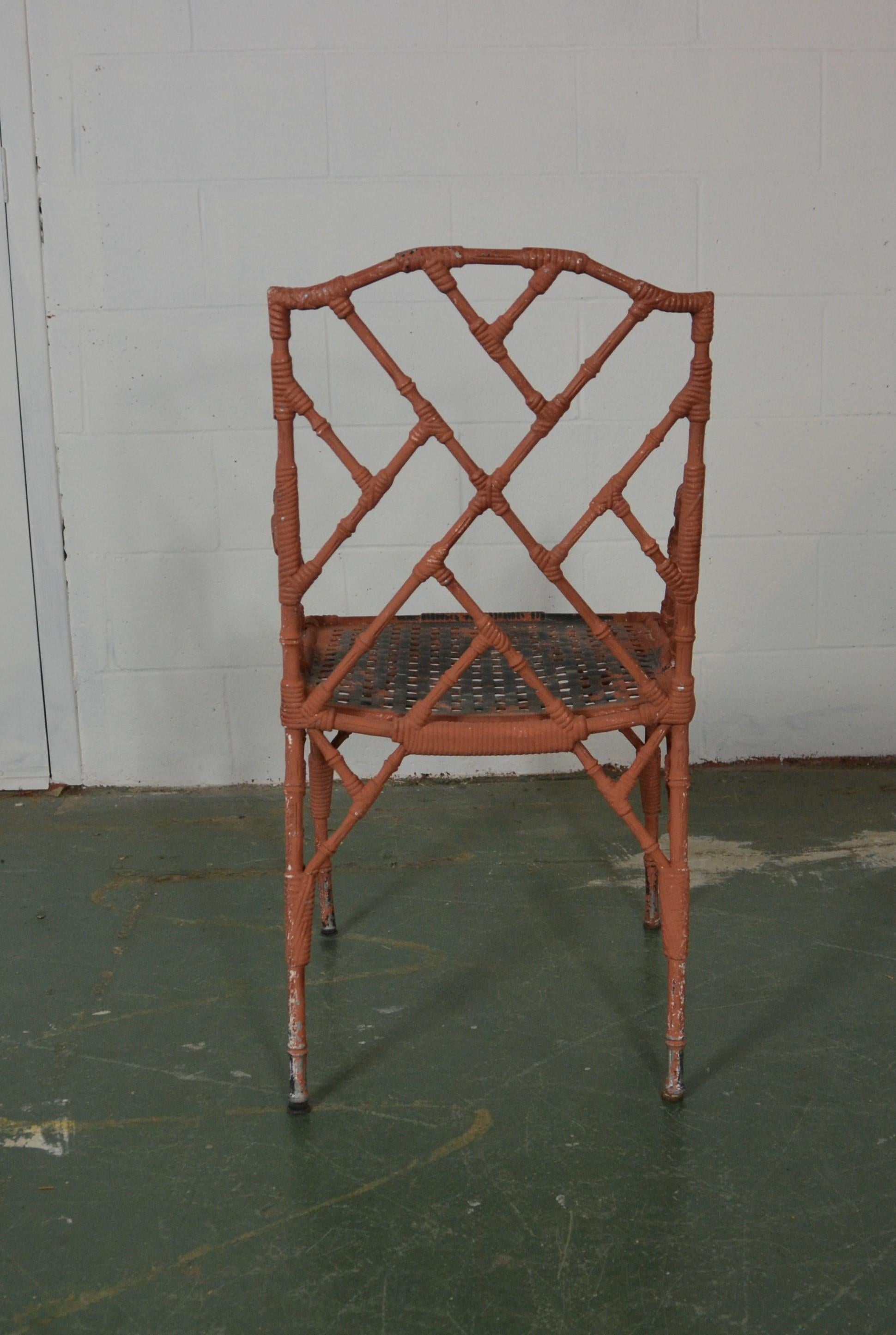 Set of four faux-bamboo metal armchairs.