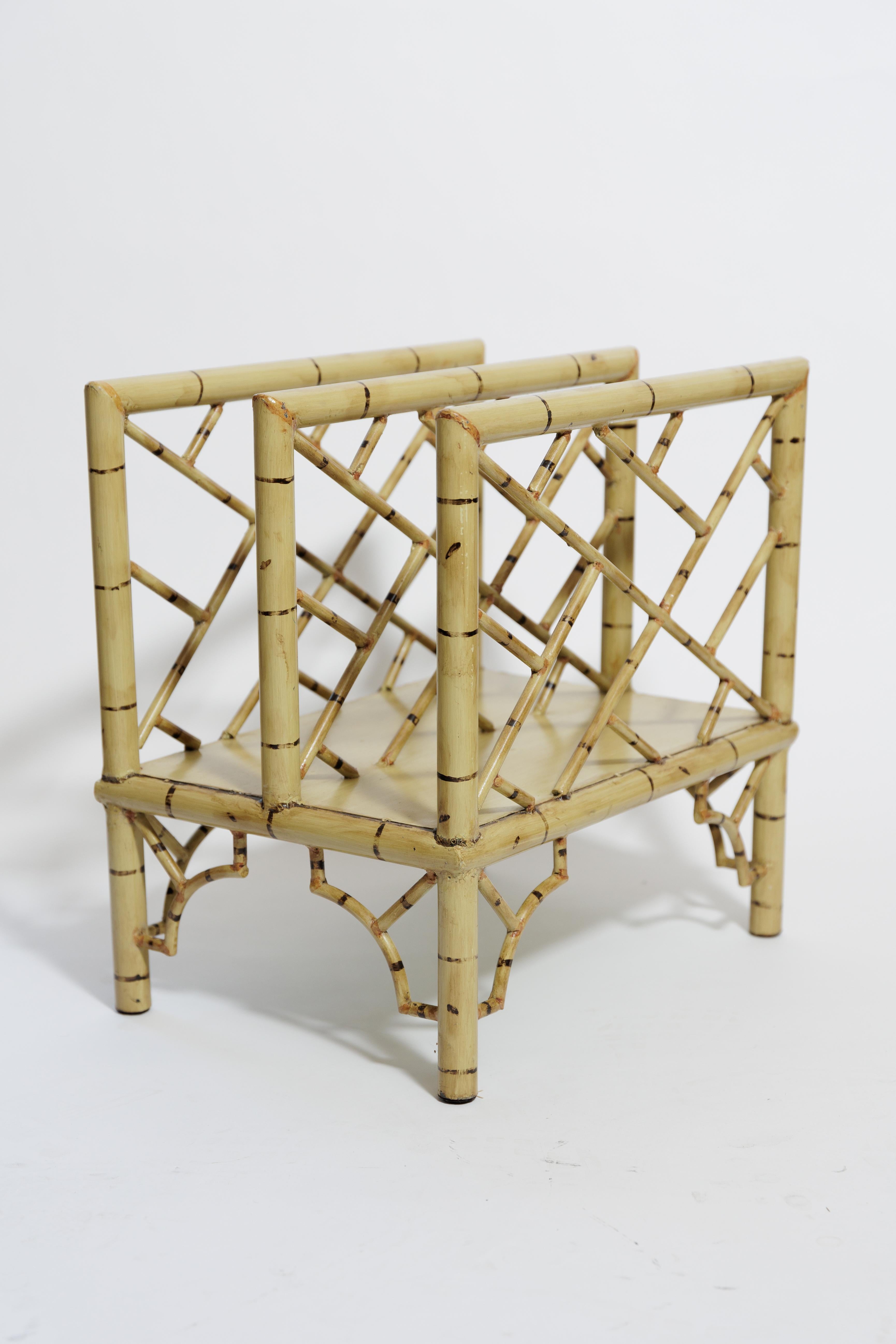A faux bamboo very heavy metal magazine holder.