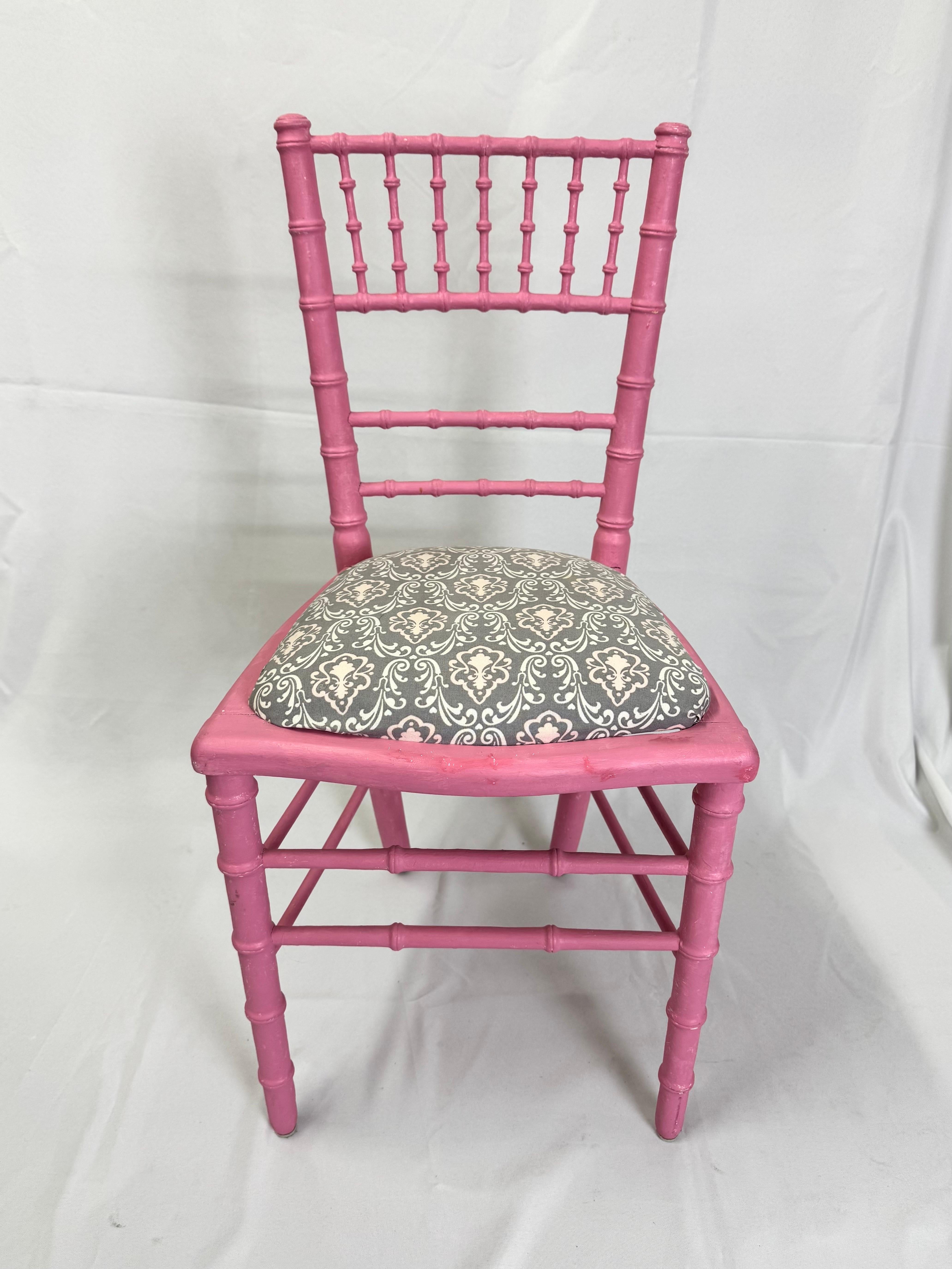 Faux Bamboo Pink Desk or Vanity Chair. Pretty in pink painted wood . Upholstered seat in tones of gray and white. Use at a desk or vanity in a child's room. 