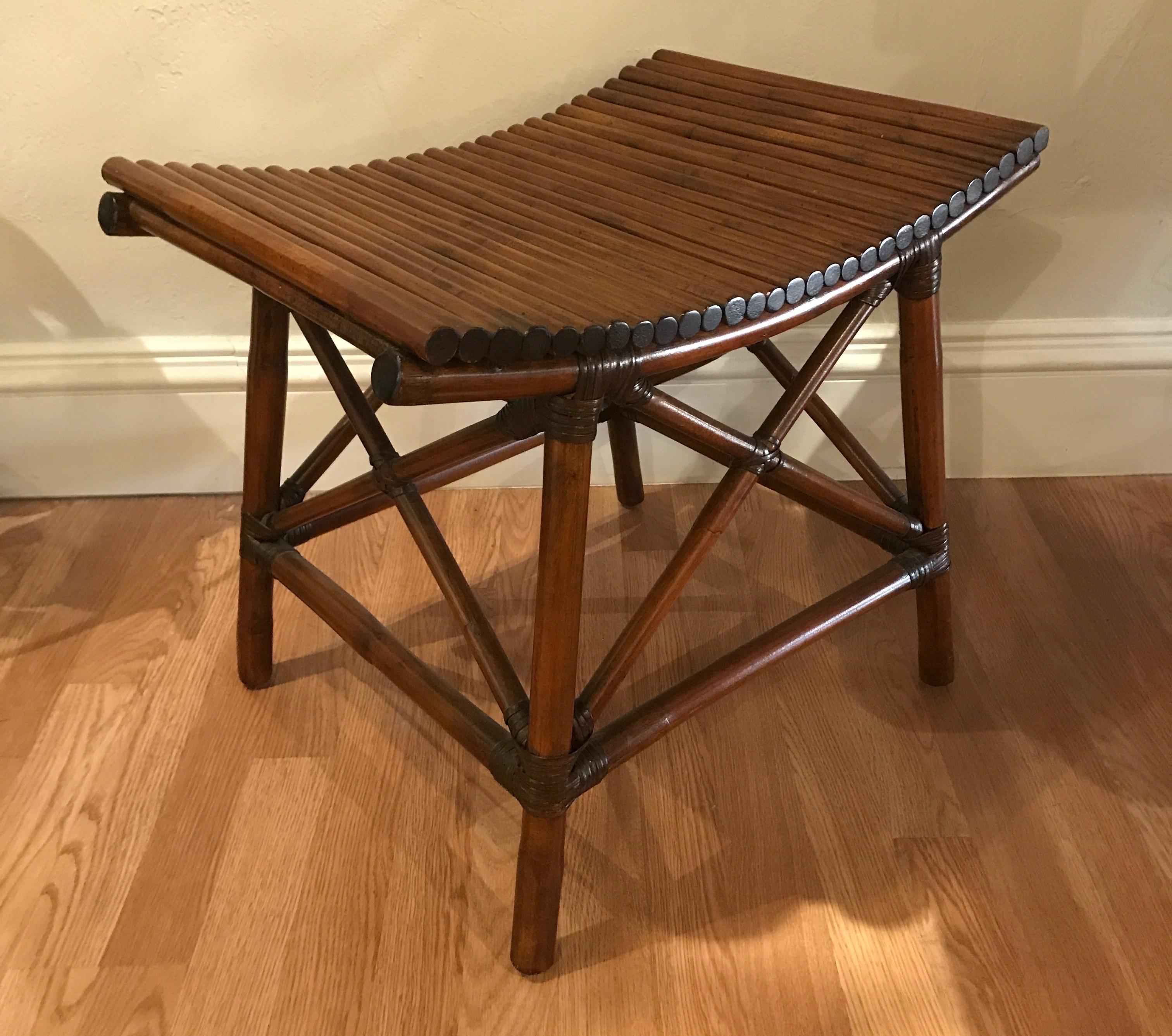 Thebes style faux bamboo stool with leather tied legs and stretchers.