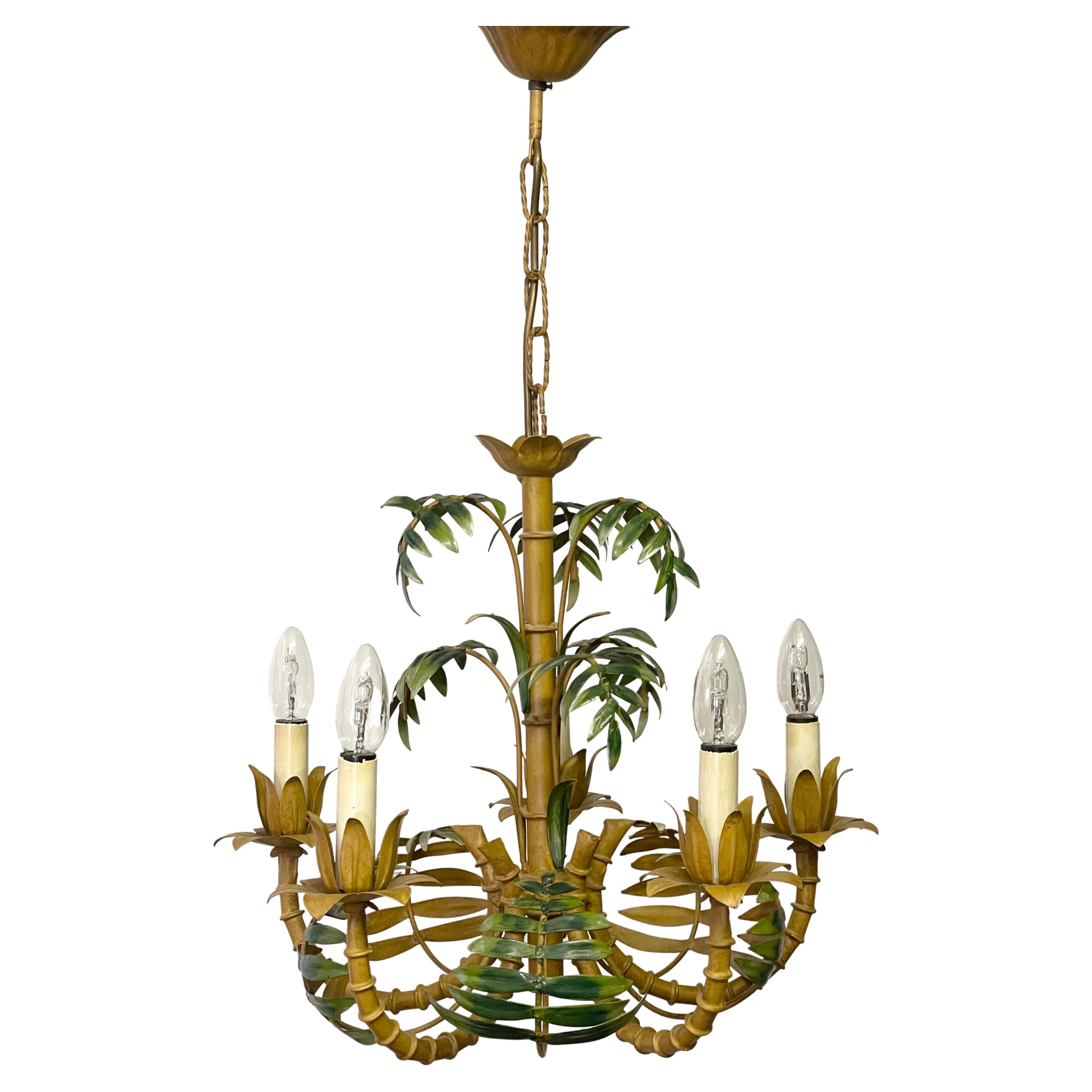 Mid-century French faux bamboo tole palm tree chandelier, circa 1950s.
This beautiful chandelier is made of patinated metal in brown and green colour.
In an very good condition.
Socket: 5 x E 14 for standard screw bulbs.