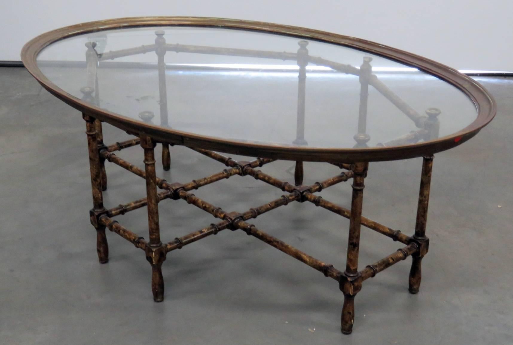 Faux bamboo tray top table with a glass insert.