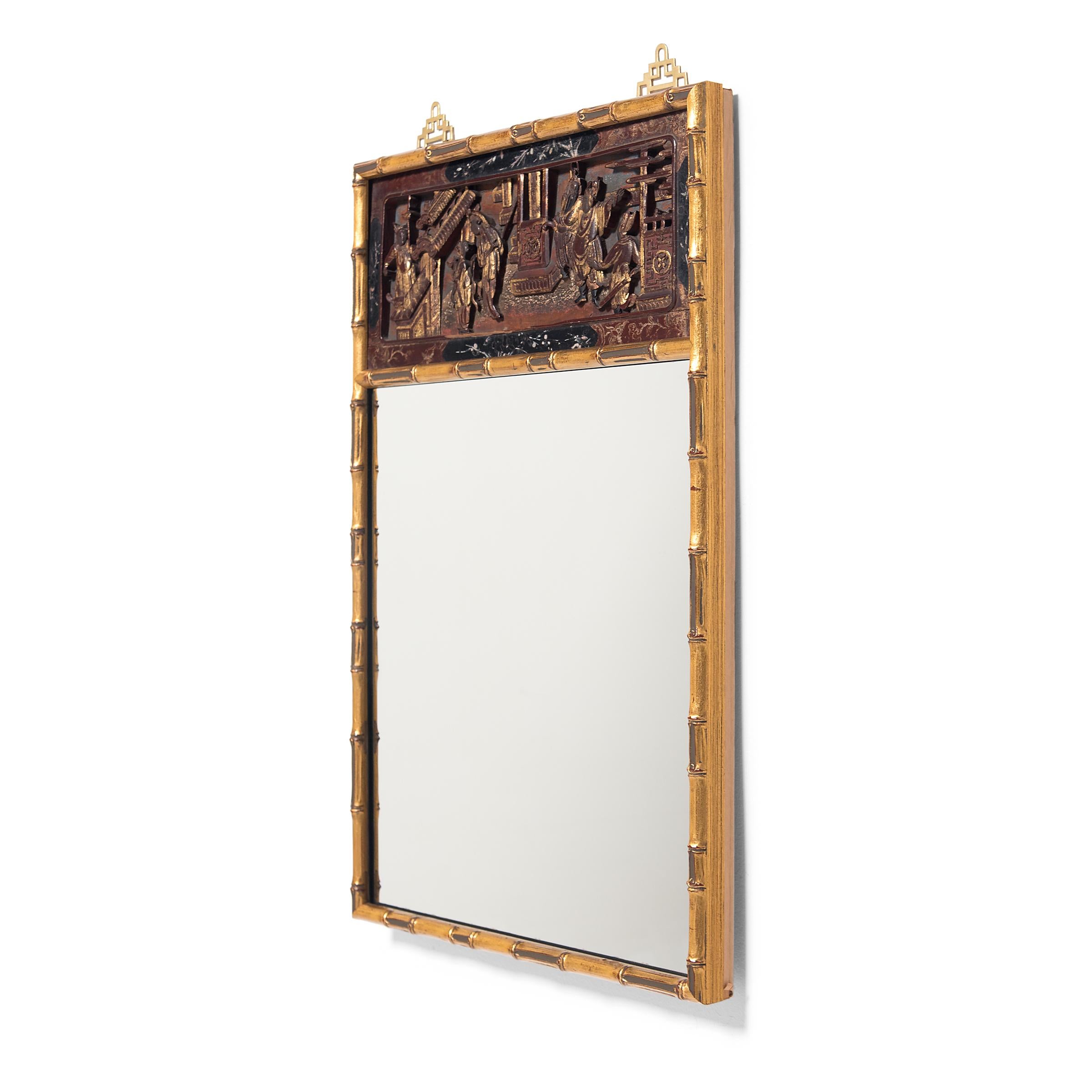 This rectangular wall mirror features an antique Chinese bed panel and a contemporary gilt frame carved to resemble lengths of segmented bamboo. Likely extracted from an antique canopy bed or cabinet, the 19th-century panel is carved in low relief