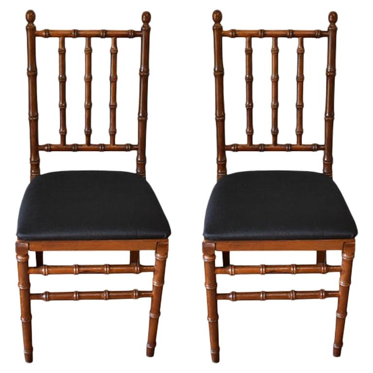 Faux Bamboo Wood Folding Chairs with Black Upholstered Seats, a Pair