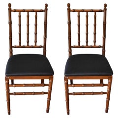 Faux Bamboo Wood Folding Chairs with Black Upholstered Seats, a Pair