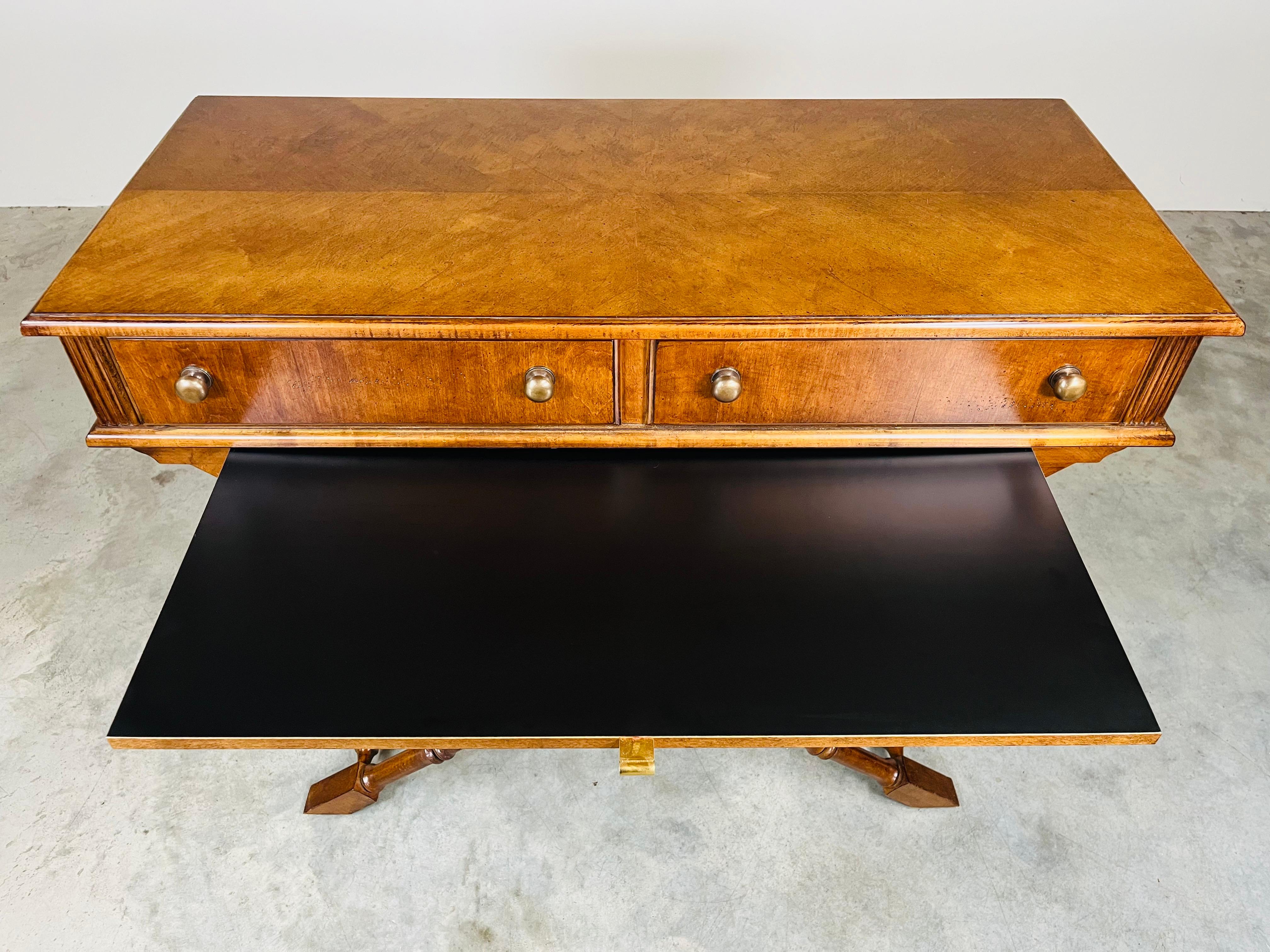 A stately design in this faux bamboo dry bar server having x-base frame adorned with brass badges under a 2 drawer gloss finished walnut top that has a water resistant pullout black top mixing shelf with solid brass pull by Lane. An incredibly rare