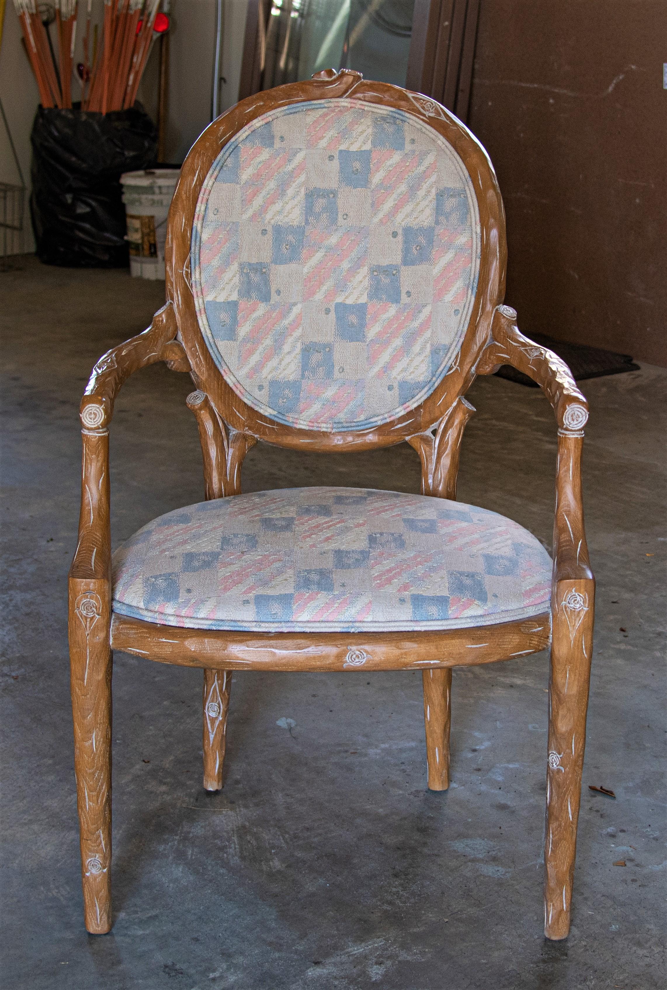 Set of six faux bois Louis XVI upholstered armchairs. Each chair features a hand carved and limed beech frame with upholstered seat and back. In very good vintage condition - all chair frames are extremely sturdy. Four chairs are upholstered in