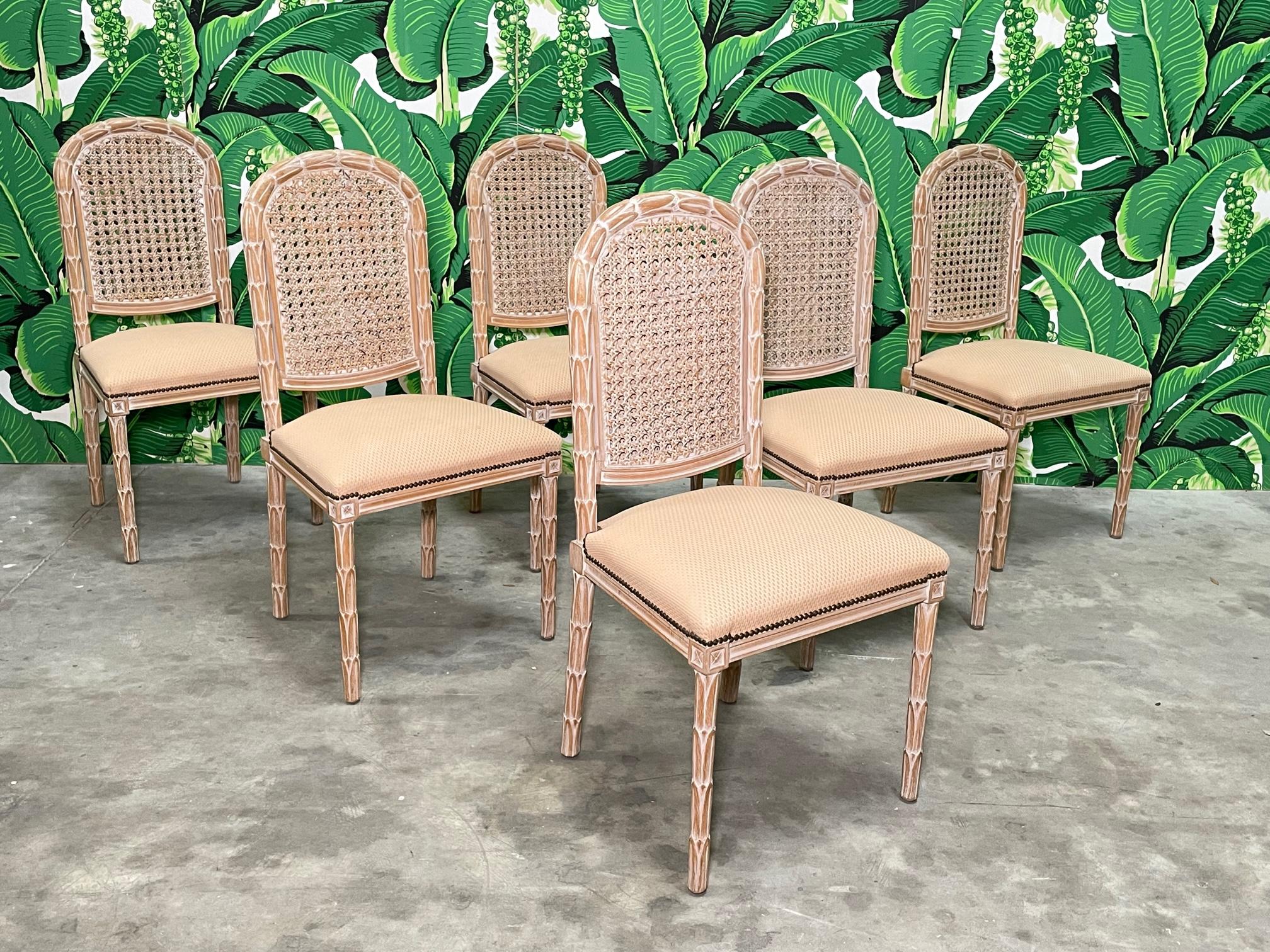 Set of six dining chairs by Fratelli Boffi of Italy feature double cane backs and faux bois carved wood frames. Good condition with imperfections consistent with age, see photos for condition details. 
For a shipping quote to your exact zip code,
