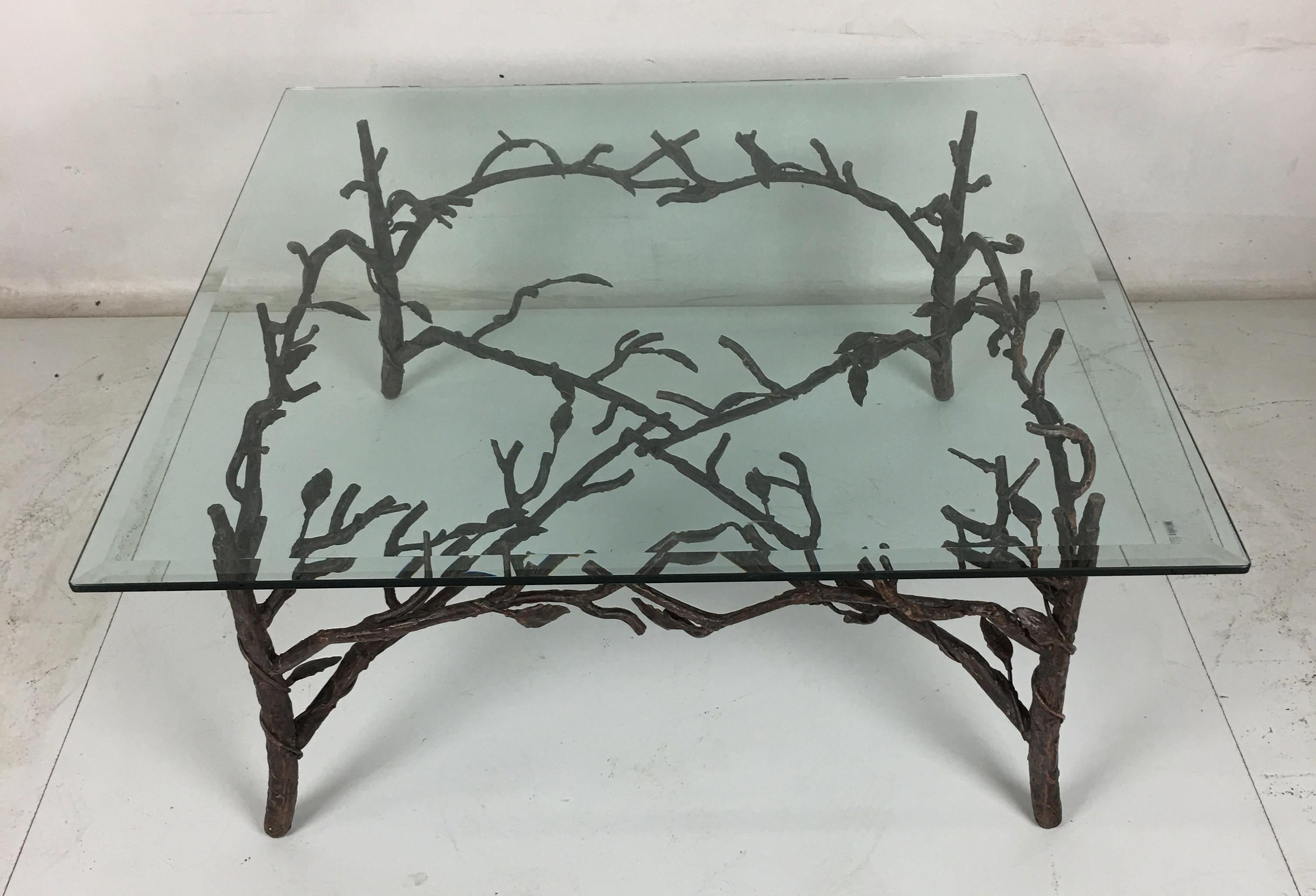 Chic faux bois coffee table in patinated metal with vined branches and leaves in the style of Diego Giacometti. The table is shown with a 36