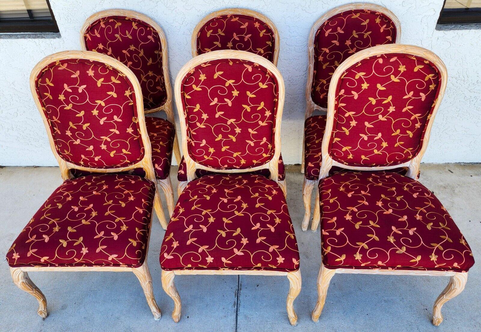 Offering one of our recent Palm Beach estate fine furniture acquisitions of
Set of 6 Chateau Dax Faux Bois Dining Chairs (labeled) 
Featuring embroidered fabric, and solid wood construction in natural color and with a clear varnish.

Approximate