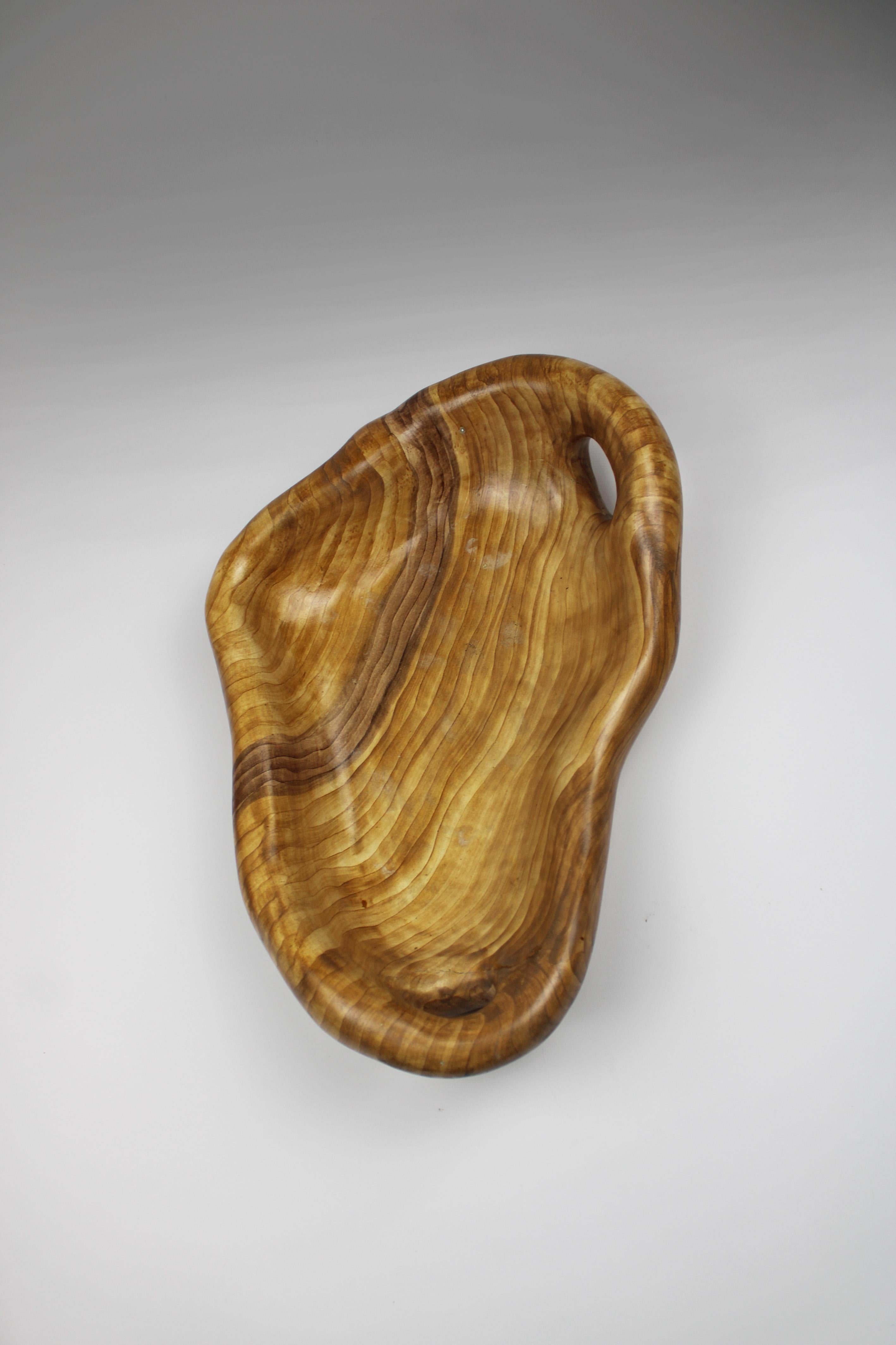 Elevate your home decor with the exquisite charm of this captivating Faux Bois fruit bowl, meticulously crafted by a revered French ceramic manufacturer renowned for its visionary designs, including those by Grandjean Jourdan. With its gracefully