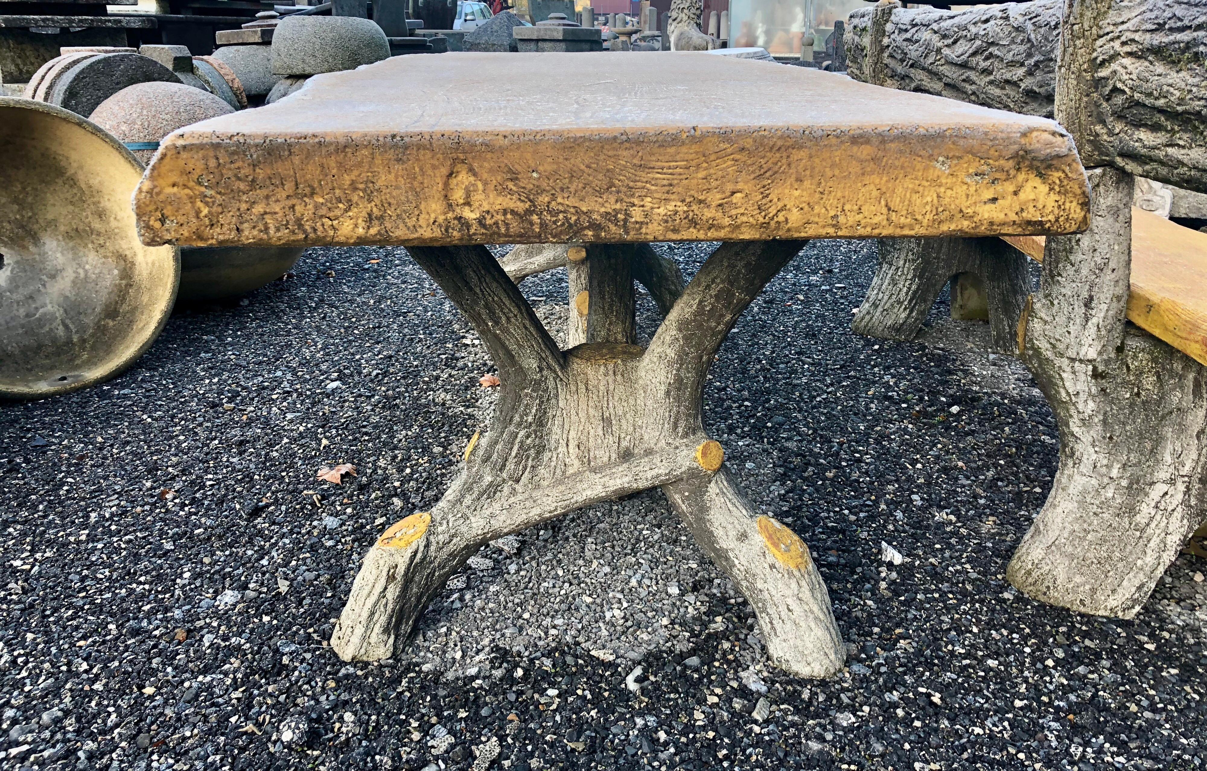 Garden table made of molded and painted concrete that look like a tree. Made in France in the 20th century.
There is also a bench available in the same style. For the table and the bench the price is special: Eur 7000
The top is yellow painted,