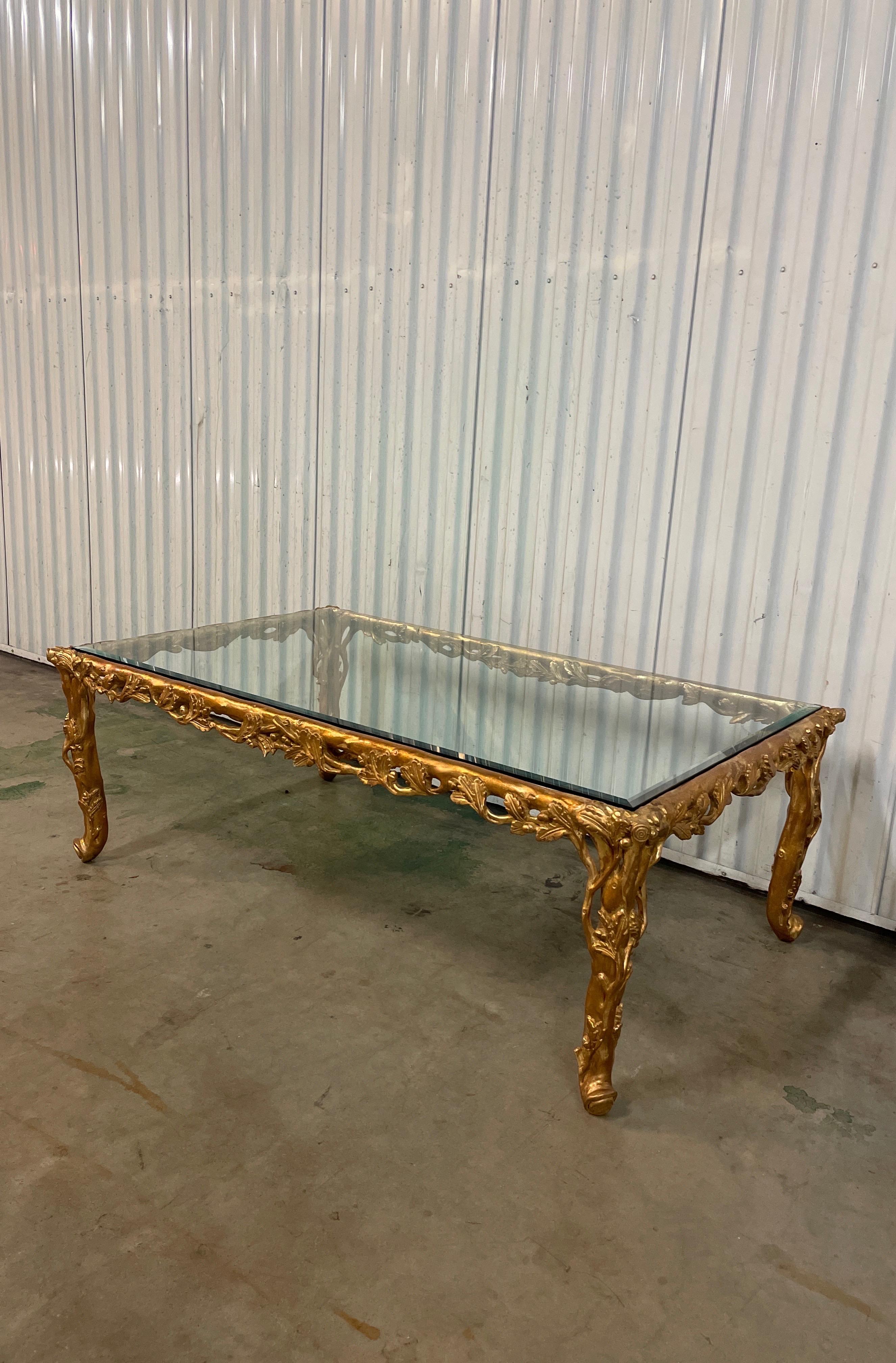 Hand carved & gilded faux Bois Italian coffee table.
