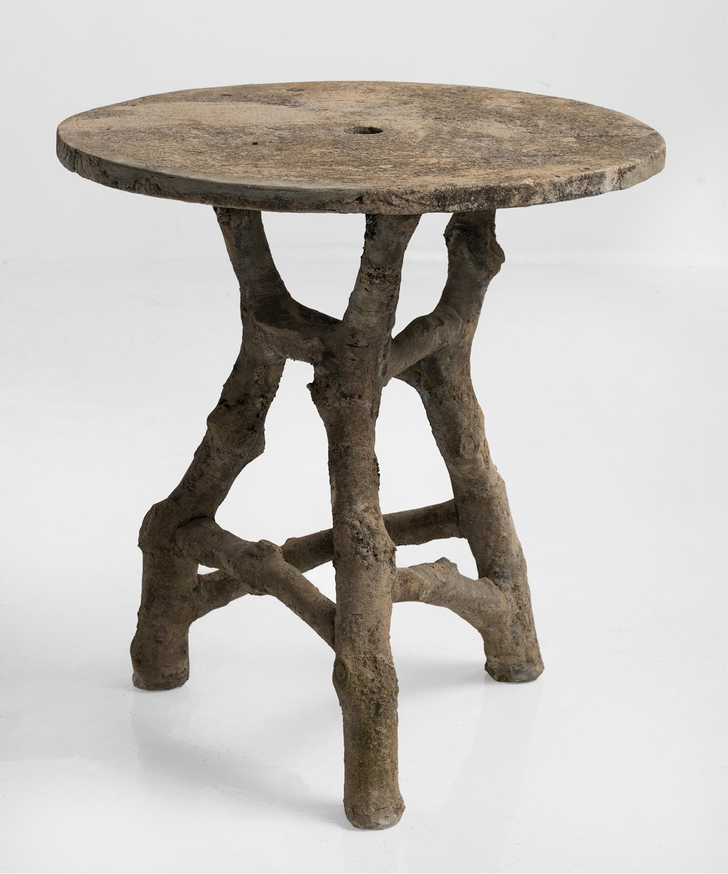 Faux bois table, France, circa 1950.

Hand-sculpted concrete table with unique form.