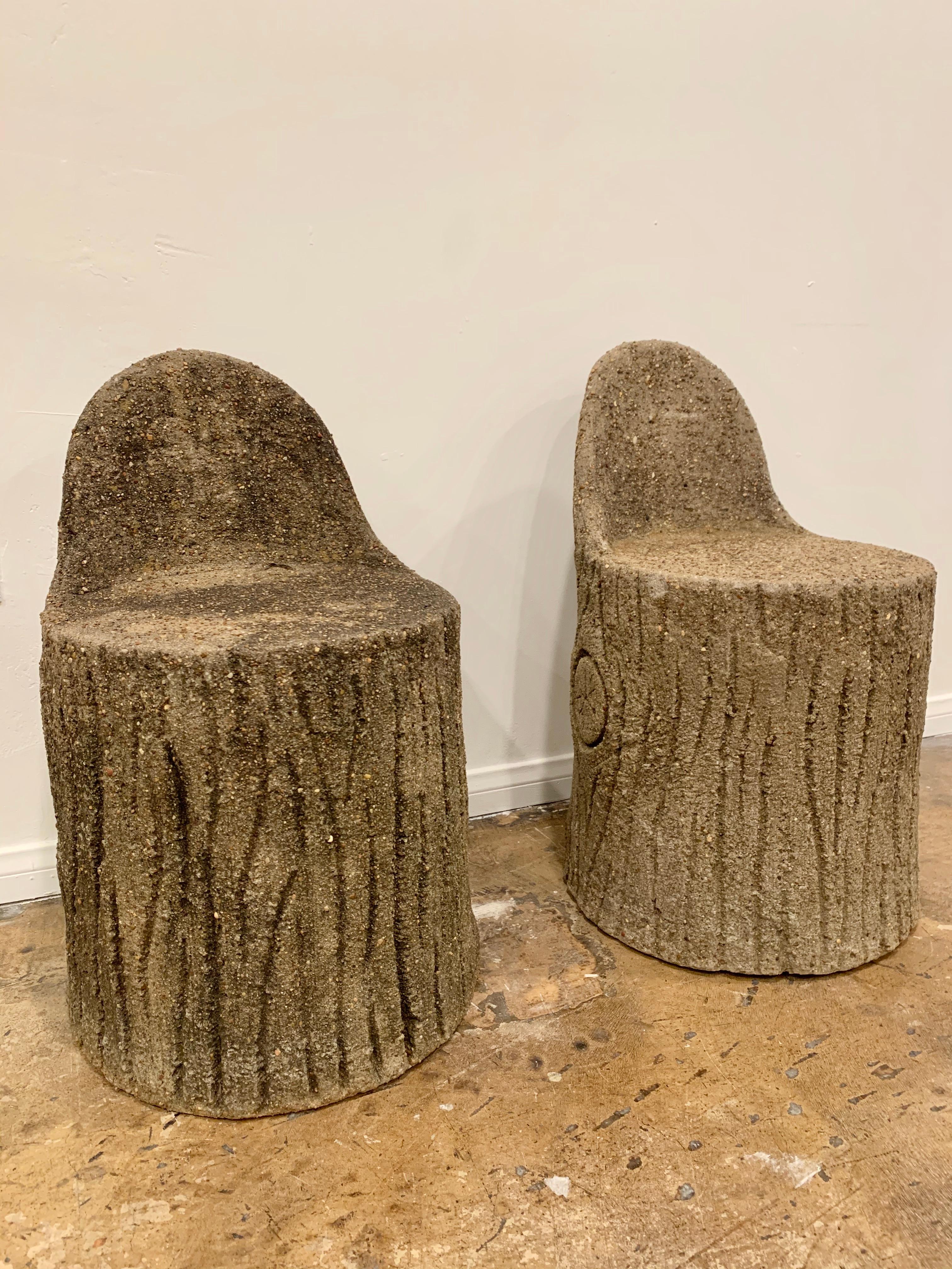 Unusual pair of faux bois chairs made of concrete aggregate. Chairs in the form a tree trunk and bark. Great scale and presence. Slightly different patinas to each chair. Great condition. Two available. Priced individually.