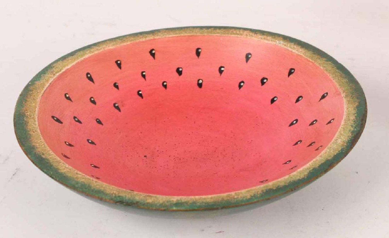 Trio of watermelon works for your pleasure. Includes a John Derian watermelon plate, a painted wood watermelon bowl, a stone watermelon slice. Watermelon: 9-1/2