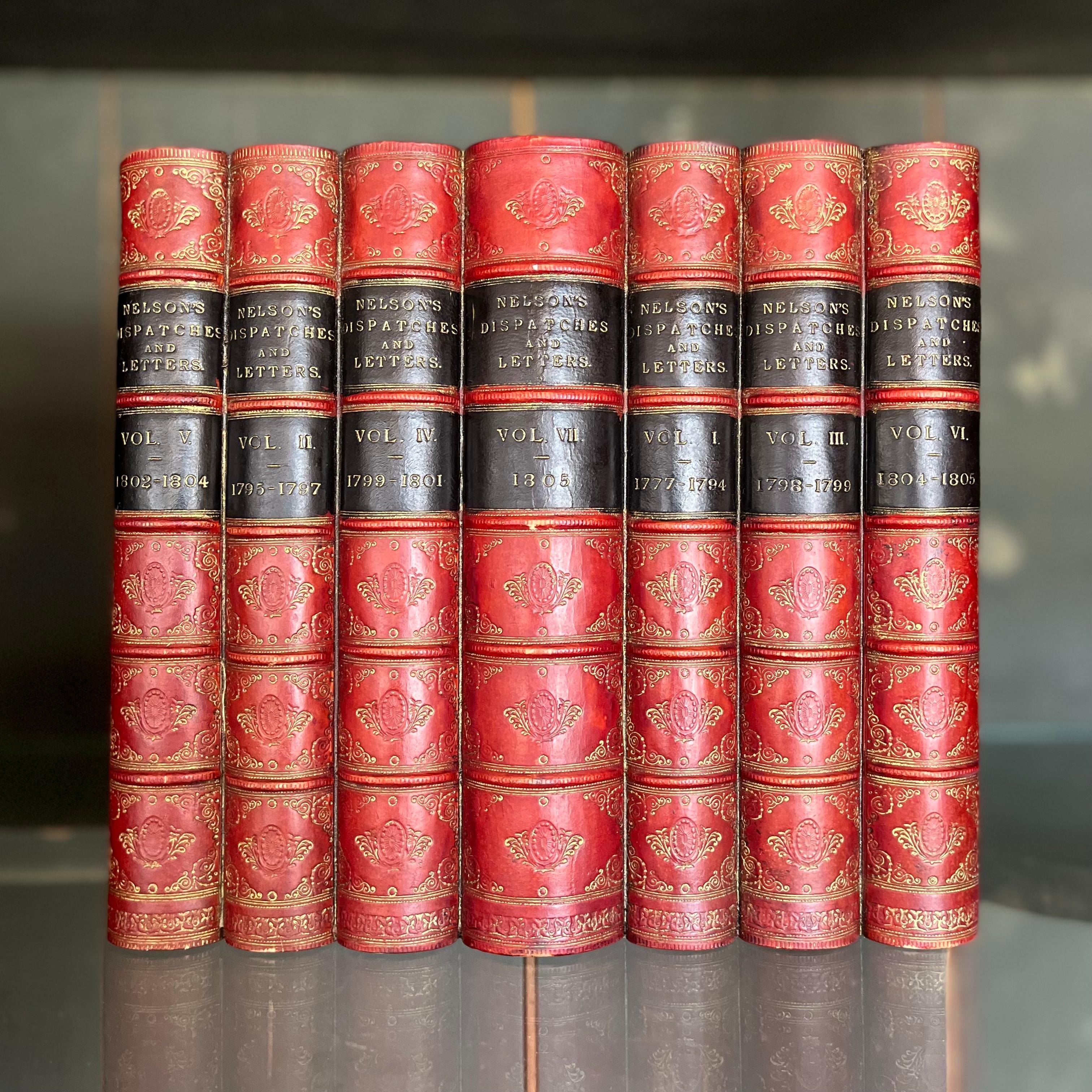 A clever piece of trompe-l'ceil, these handsome turn of the century English bookends resemble a collection of leather-bound, gilt-embossed book spines (specifically, the collected volumes I-VII of 