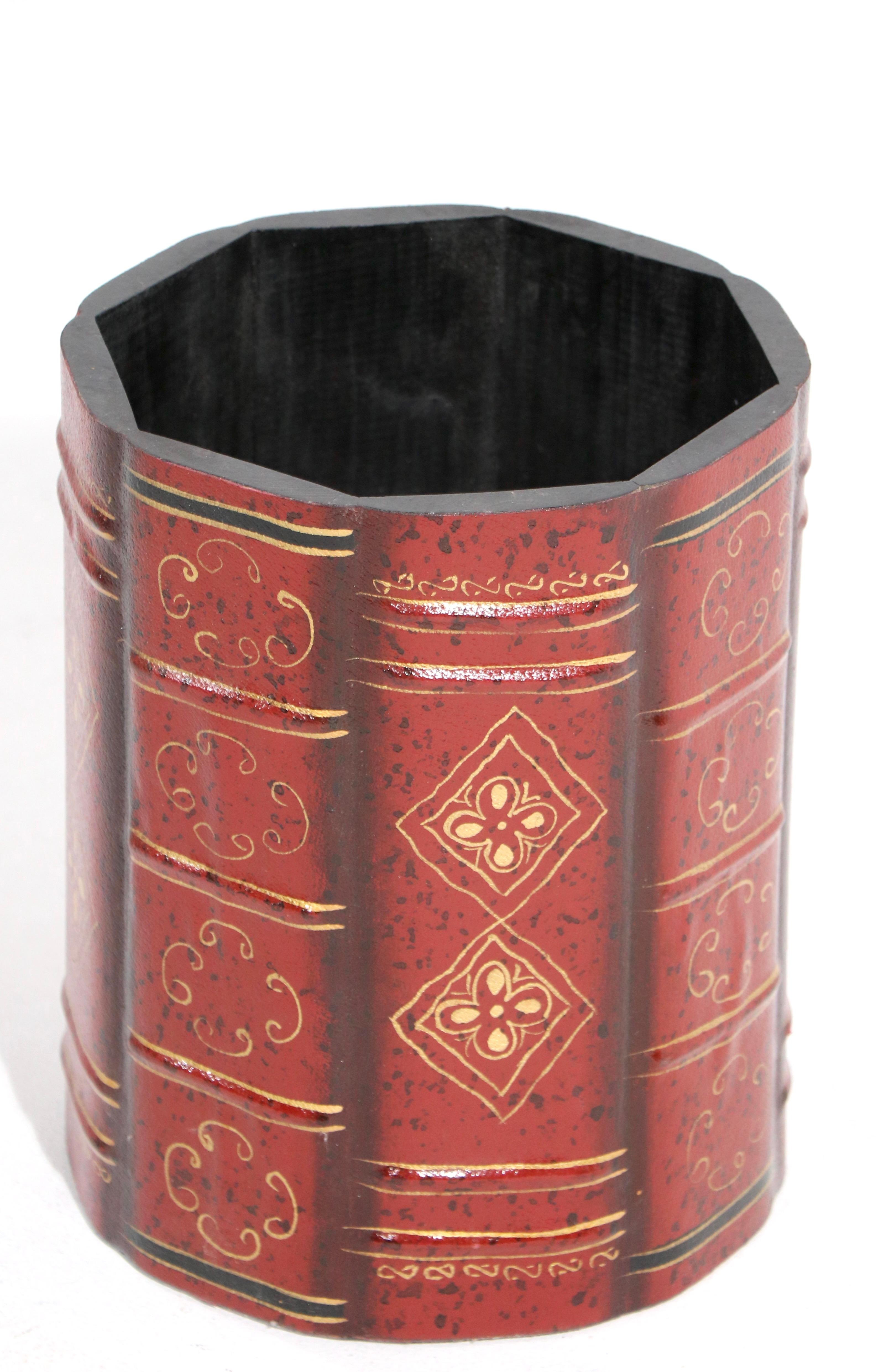 Nice vintage trash can with faux leather book spine construction motif. This example is in very clean, ready to use condition.