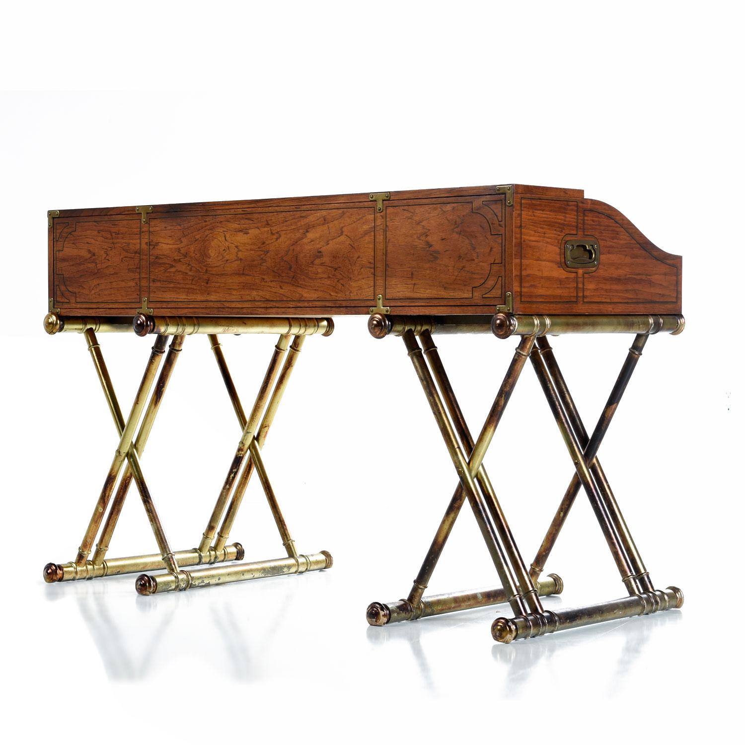This is not a 19th century British Campaign roll top desk. It's way better. Why? Because it was made in 1970s in America by Drexel with all the bizarre, stately flamboyance and none of the pesky practicality that real Campaign furniture comes with.