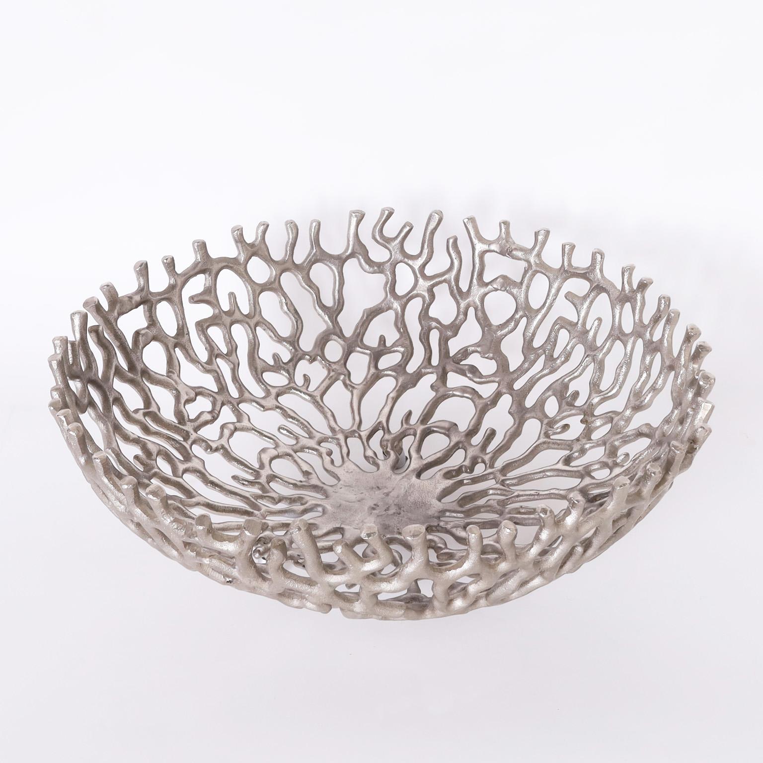 Chic modern style fruit bowl crafted in cast aluminum with a bold faux coral composition.