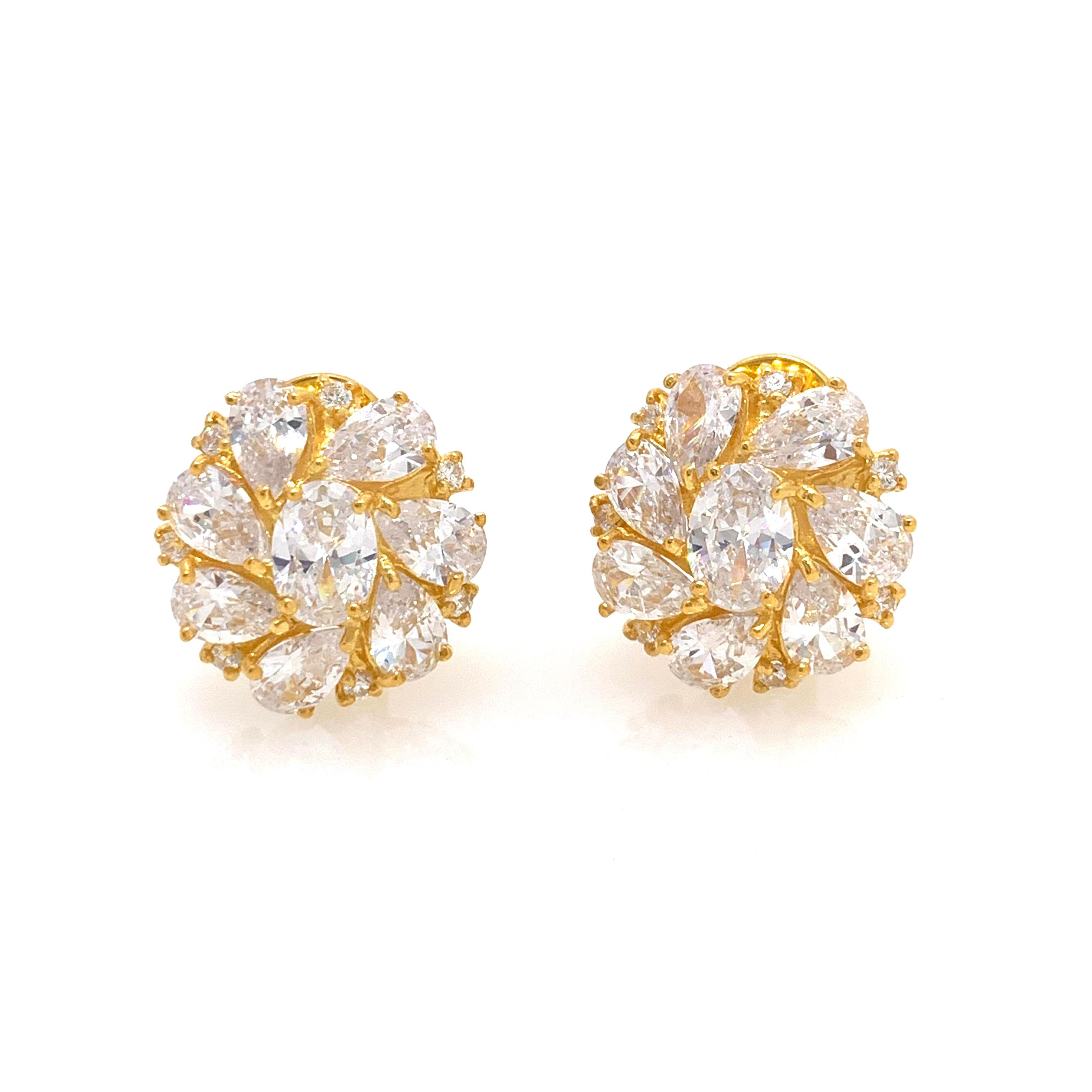 Stunning  Simulated Diamond Cluster Vermeil Earrings. 

These estate-style earrings feature 30 pieces of beautiful AAA quality simulated diamond cz in various shape, handset in 18k gold vermeil over sterling silver.  Straight post with omega clip