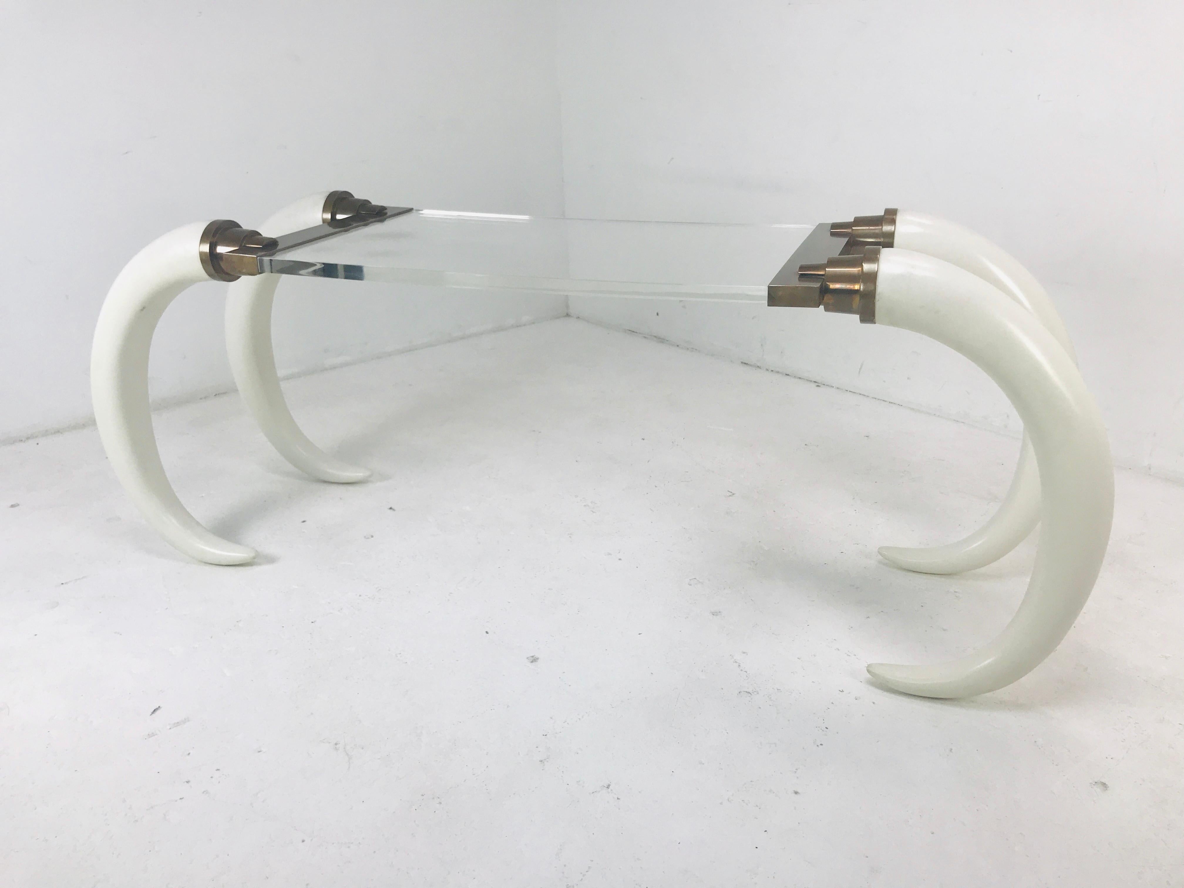 1970s elephant tusk console with Lucite top by Suzanne Dahl & Jeremy Barich. Designed for the Versailles collection. Finished with brass along both sides.