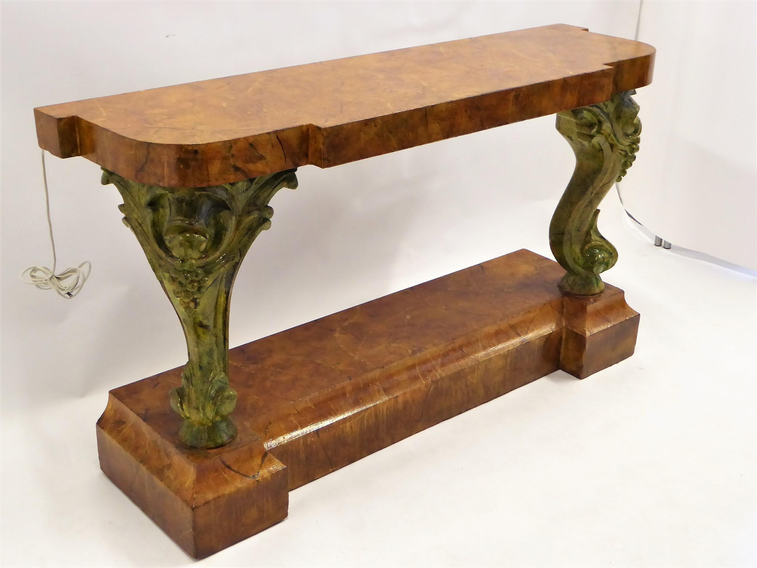 REDUCED FROM $2,950....Massive and beautifully carved Victorian Grand Piano legs highlight this later imagined Romantic Console. With a striking faux marble finish in vibrant colors, the shaped top and tapering plinth base. Exuberant rococo revival