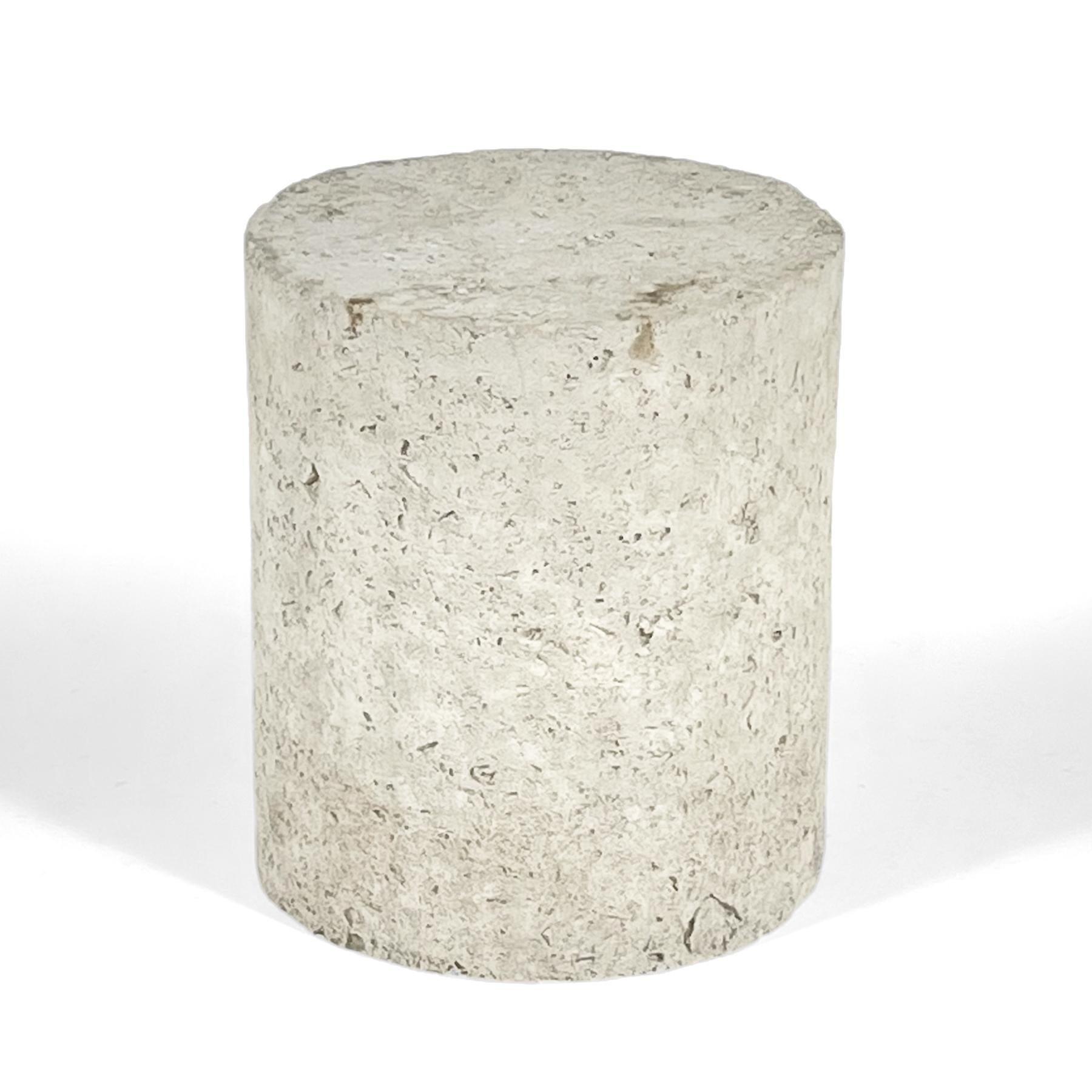 This terrific occasional table of faux fossilized stone is the perfect scale to serve as either a side/ end table a nightstand, or a pedestal. The simple cylindrical form has a rich varied texture and subtle color.

20.5