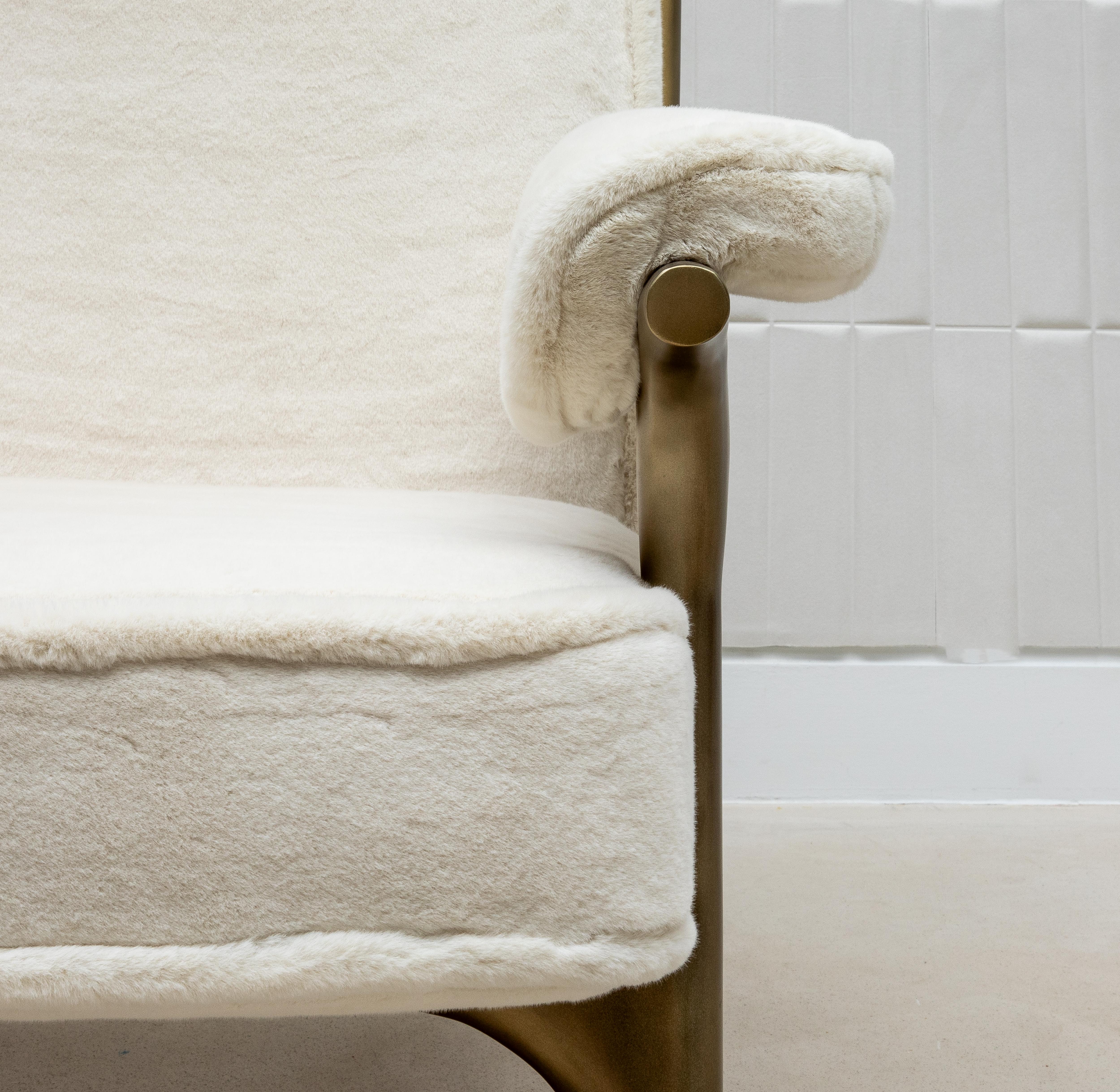 Contemporary Faux Fur Armchair and Ottoman with Bronze Patina Brass Accents by R&Y Augousti For Sale