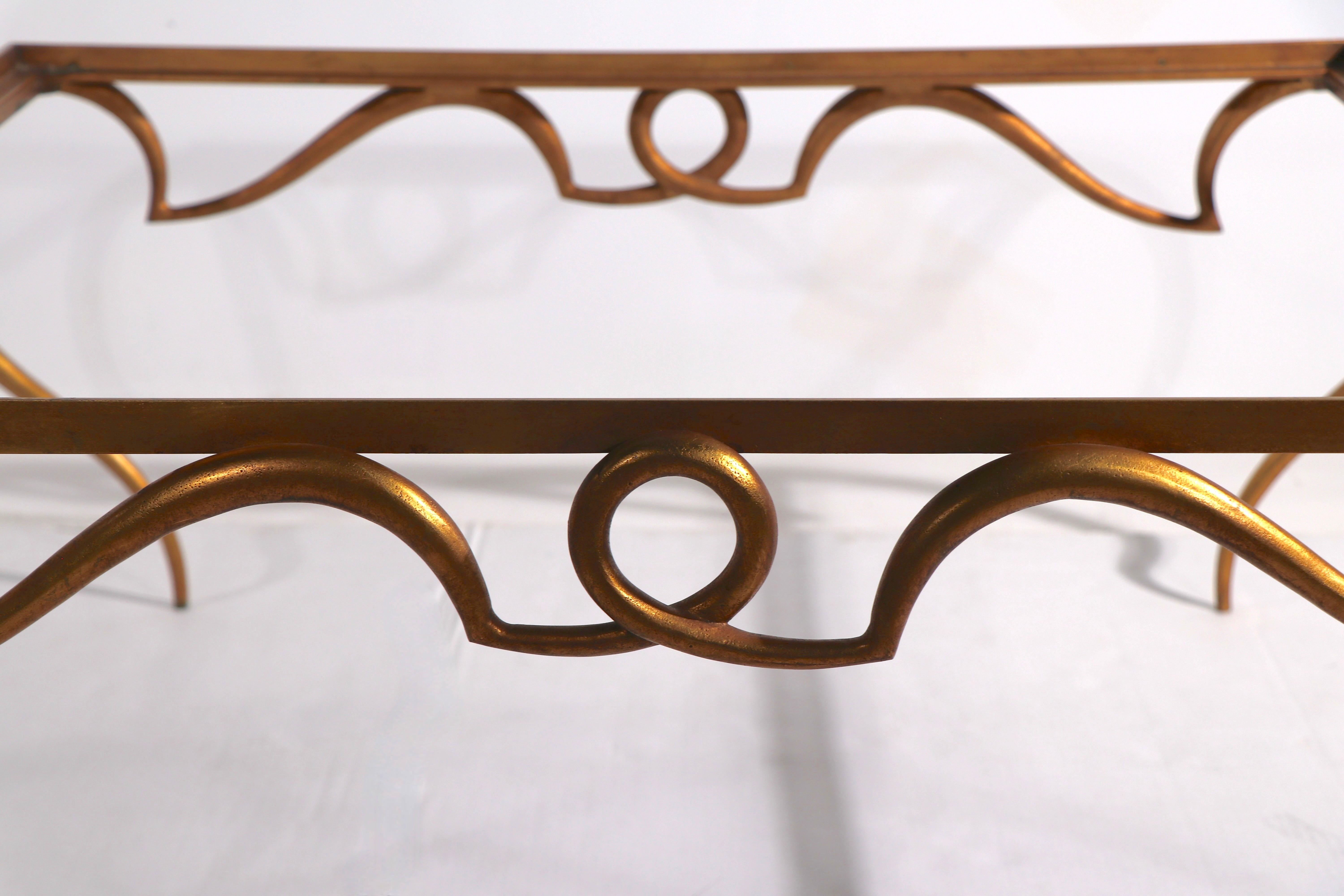 French Faux Gilt Metal Scrollwork and Glass Coffee Table att. to Rene Drouet For Sale